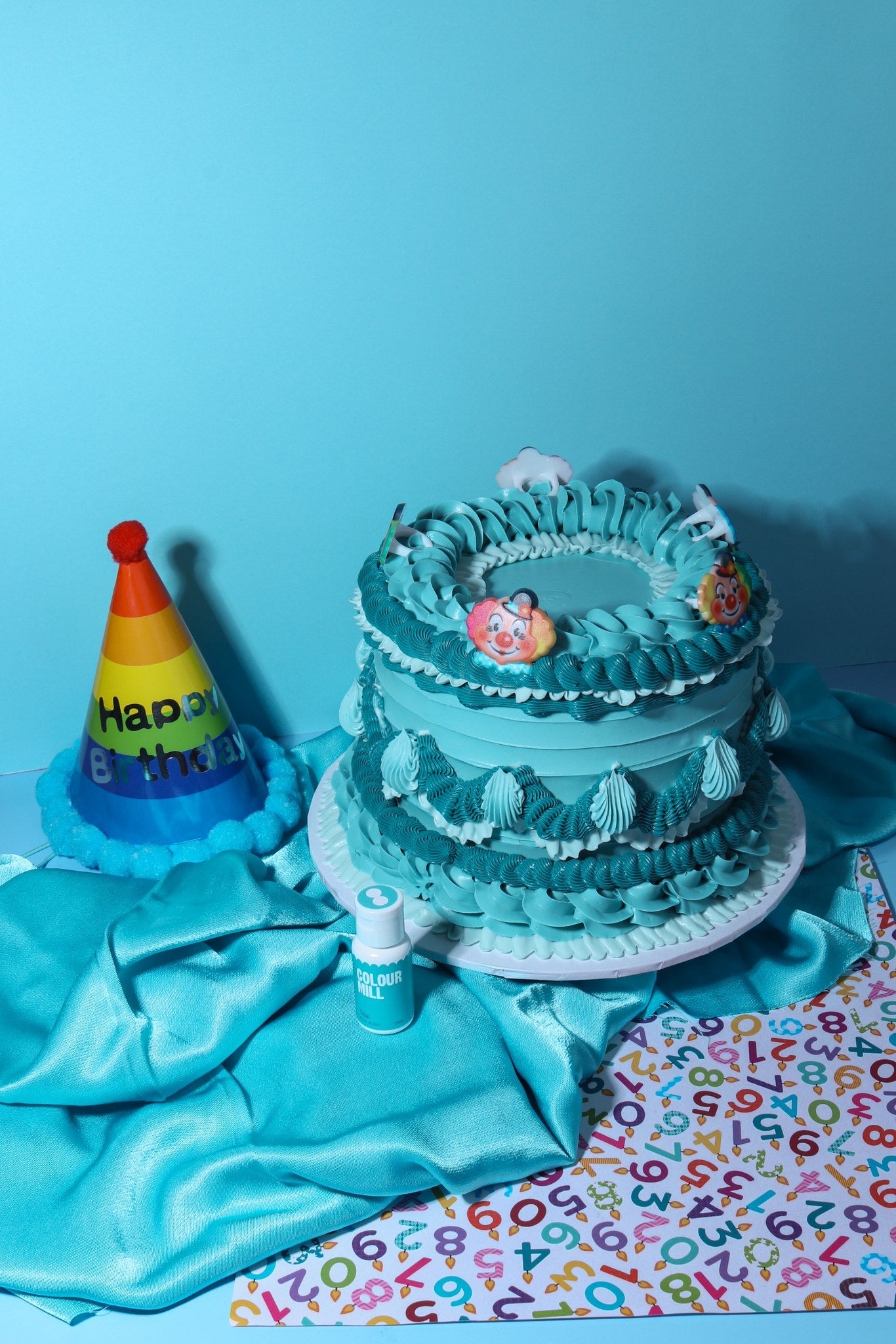Cake decorated with buttercream colored using Colour Mill Teal oil based food coloring
