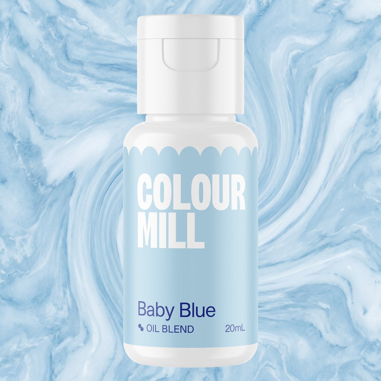 Colour Mill Baby Blue 20ml oil based food coloring bottle on a marbled background