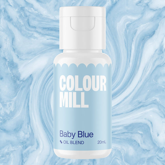 Colour Mill Baby Blue 20ml oil based food coloring bottle on a marbled background