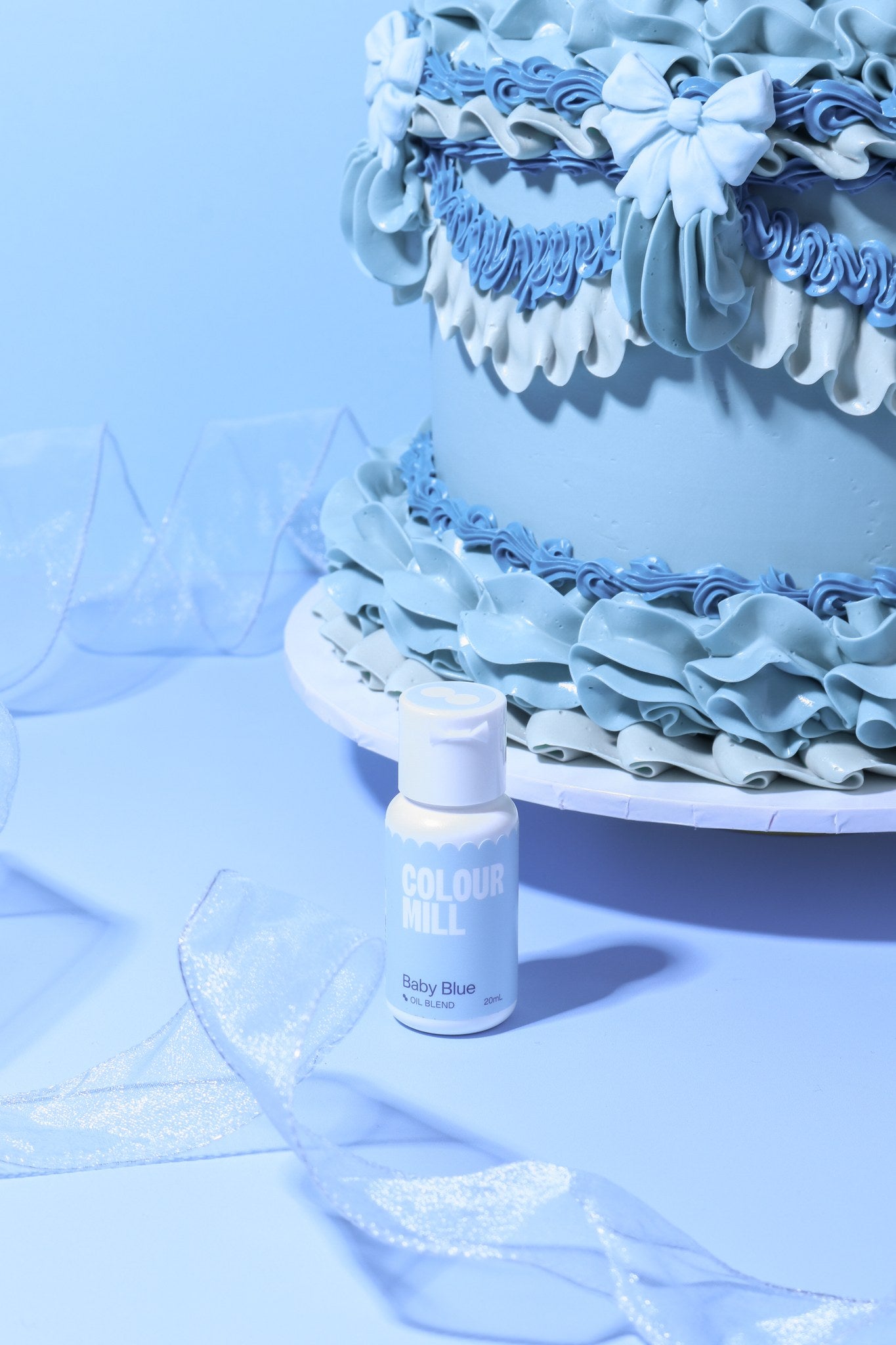 Cake decorated with buttercream colored using Colour Mill Baby Blue oil based food coloring