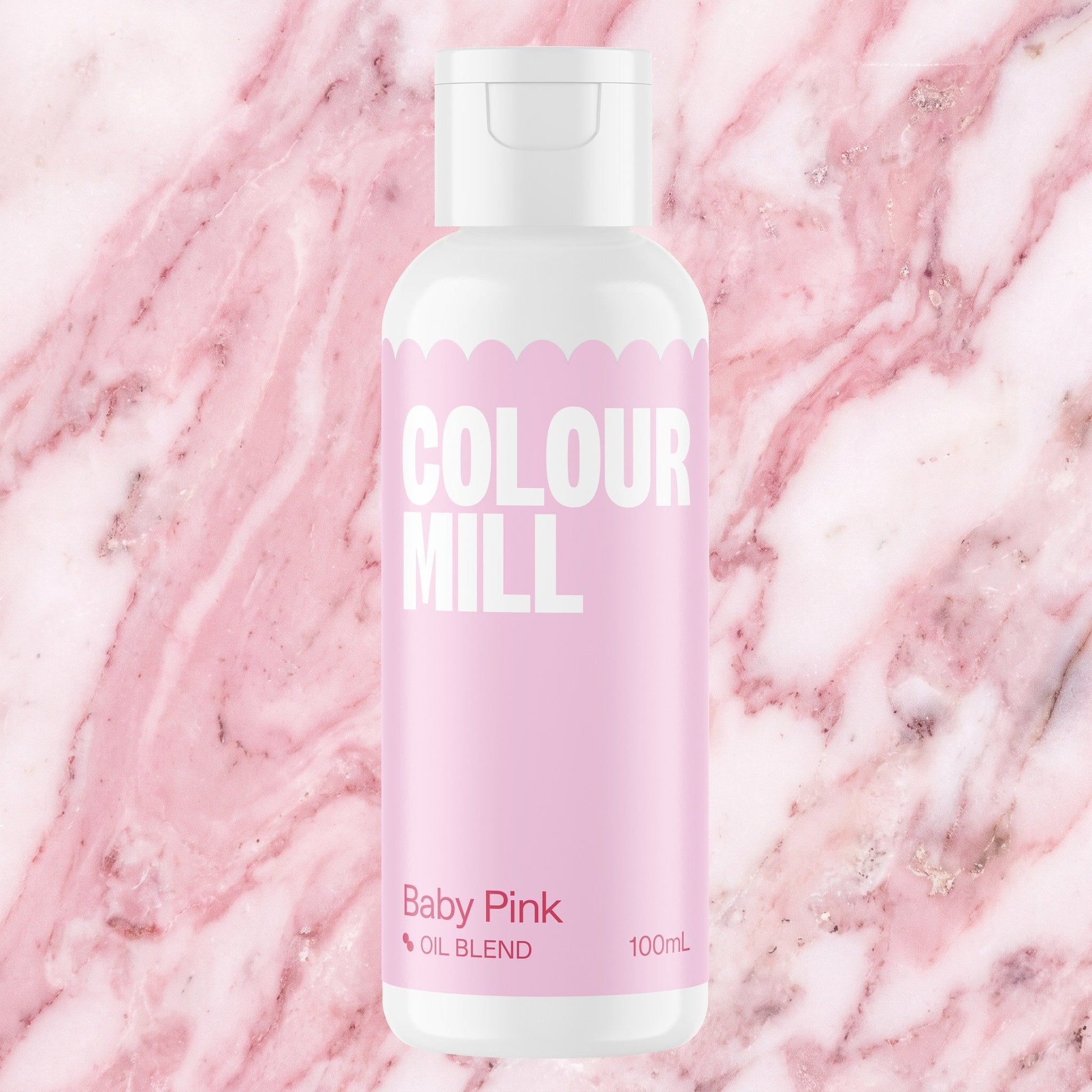 Colour Mill Baby Pink 100ml oil based food coloring bottle on a marbled background