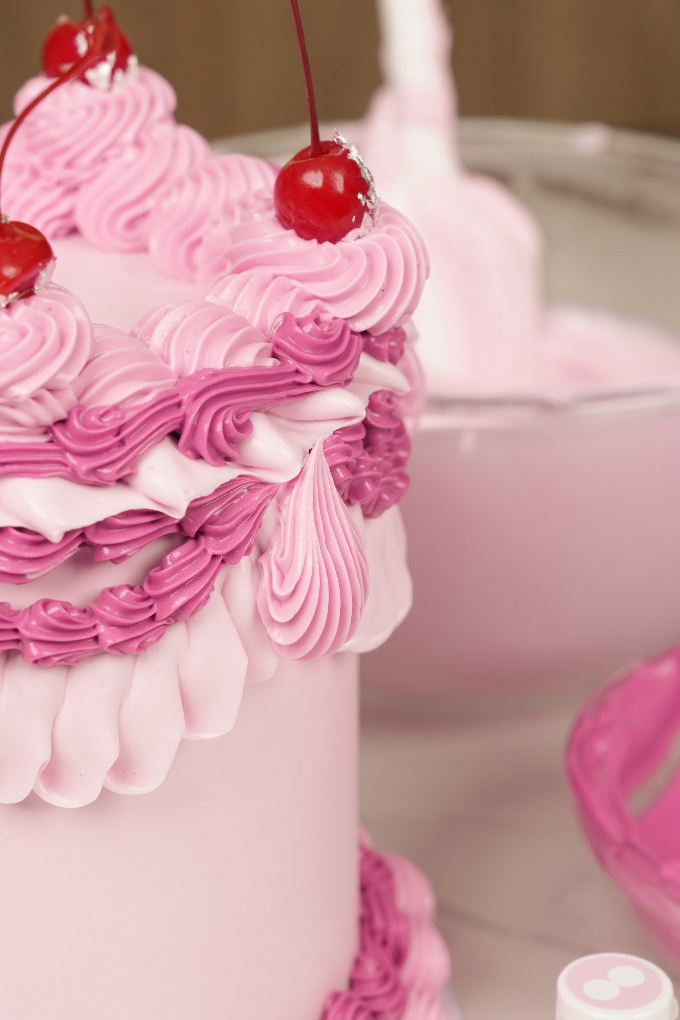 Cake decorated with buttercream colored using Colour Mill Baby Pink oil based food coloring