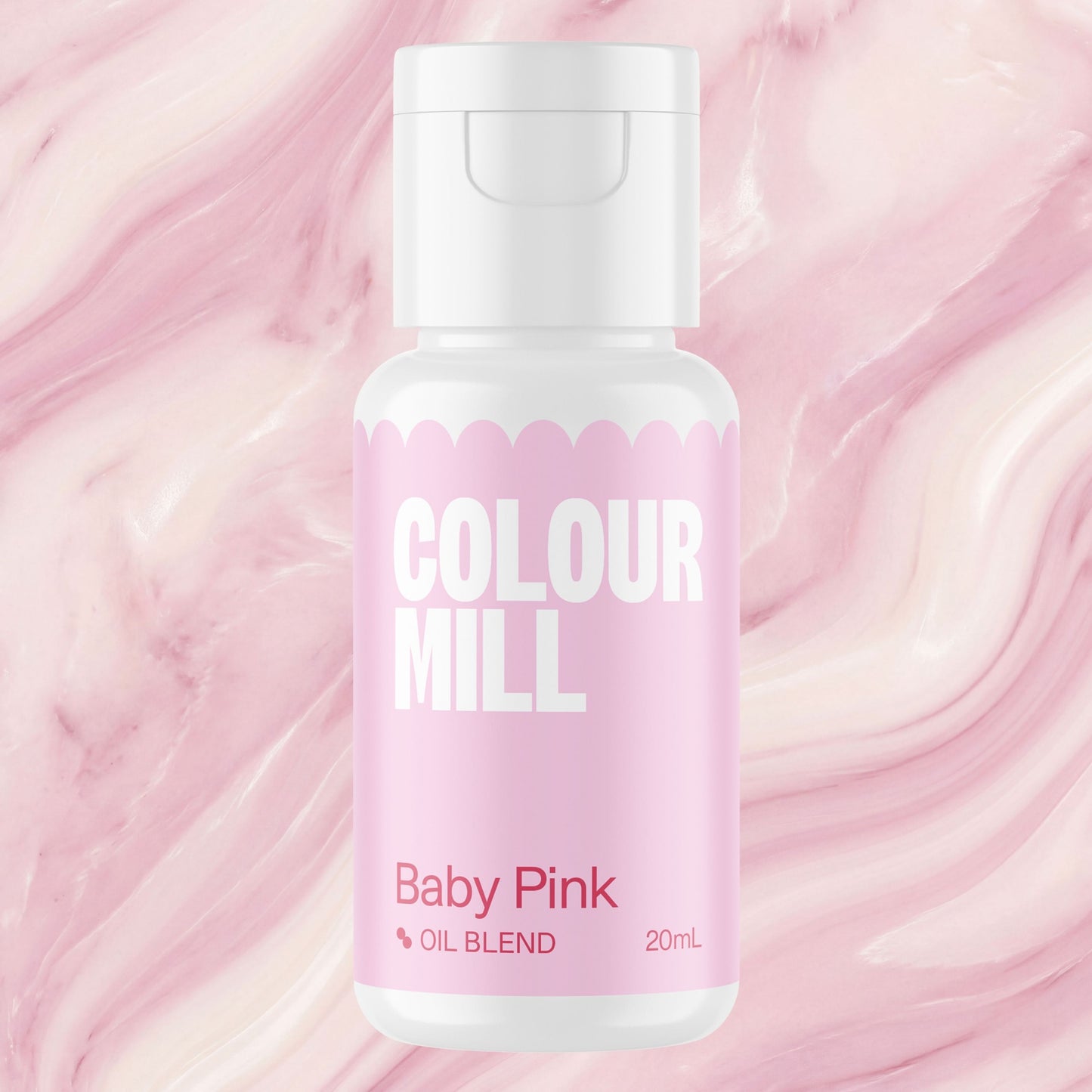 Colour Mill Baby Pink oil based food coloring bottle on a marbled background