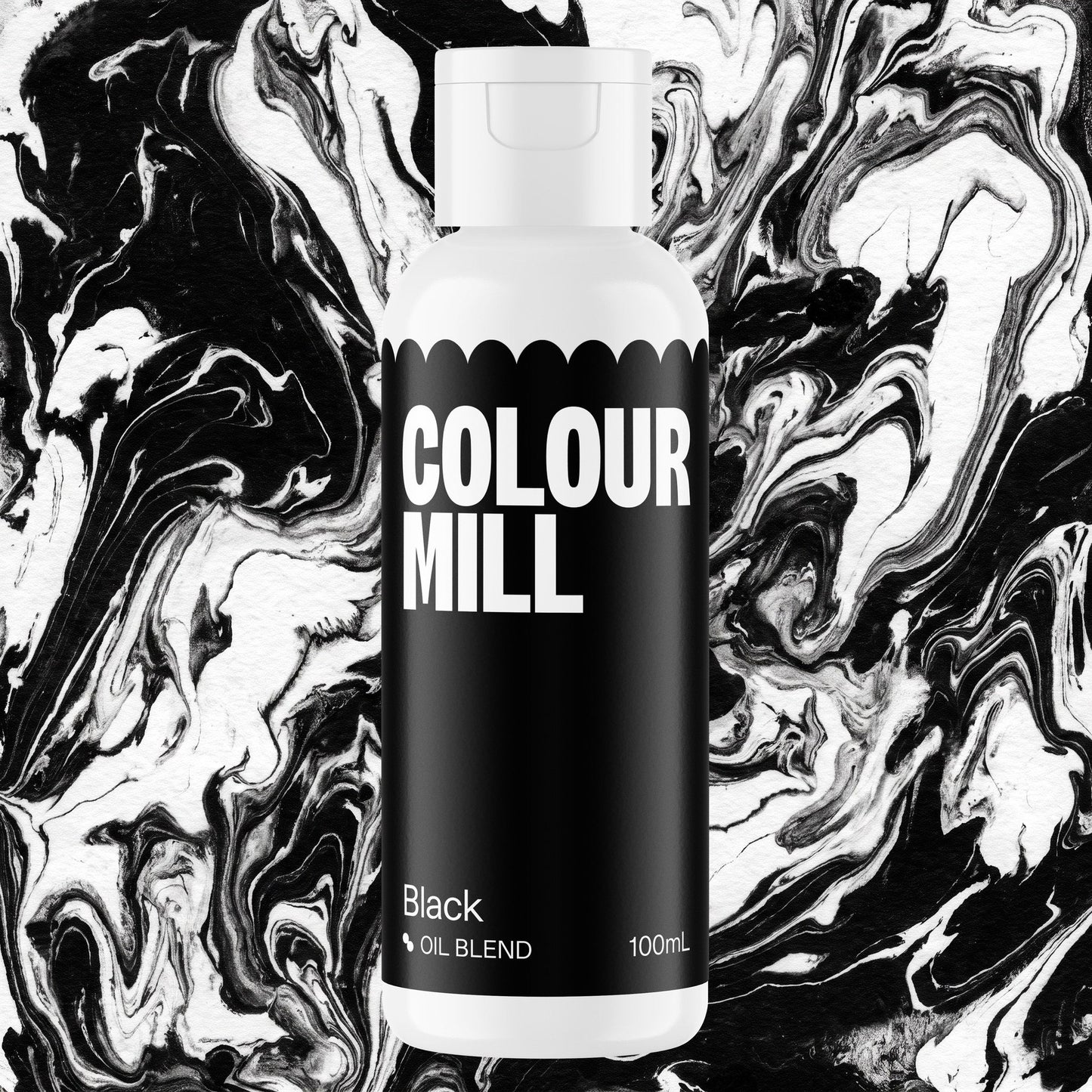Colour Mill Black 100ml oil based food coloring bottle on a marbled background