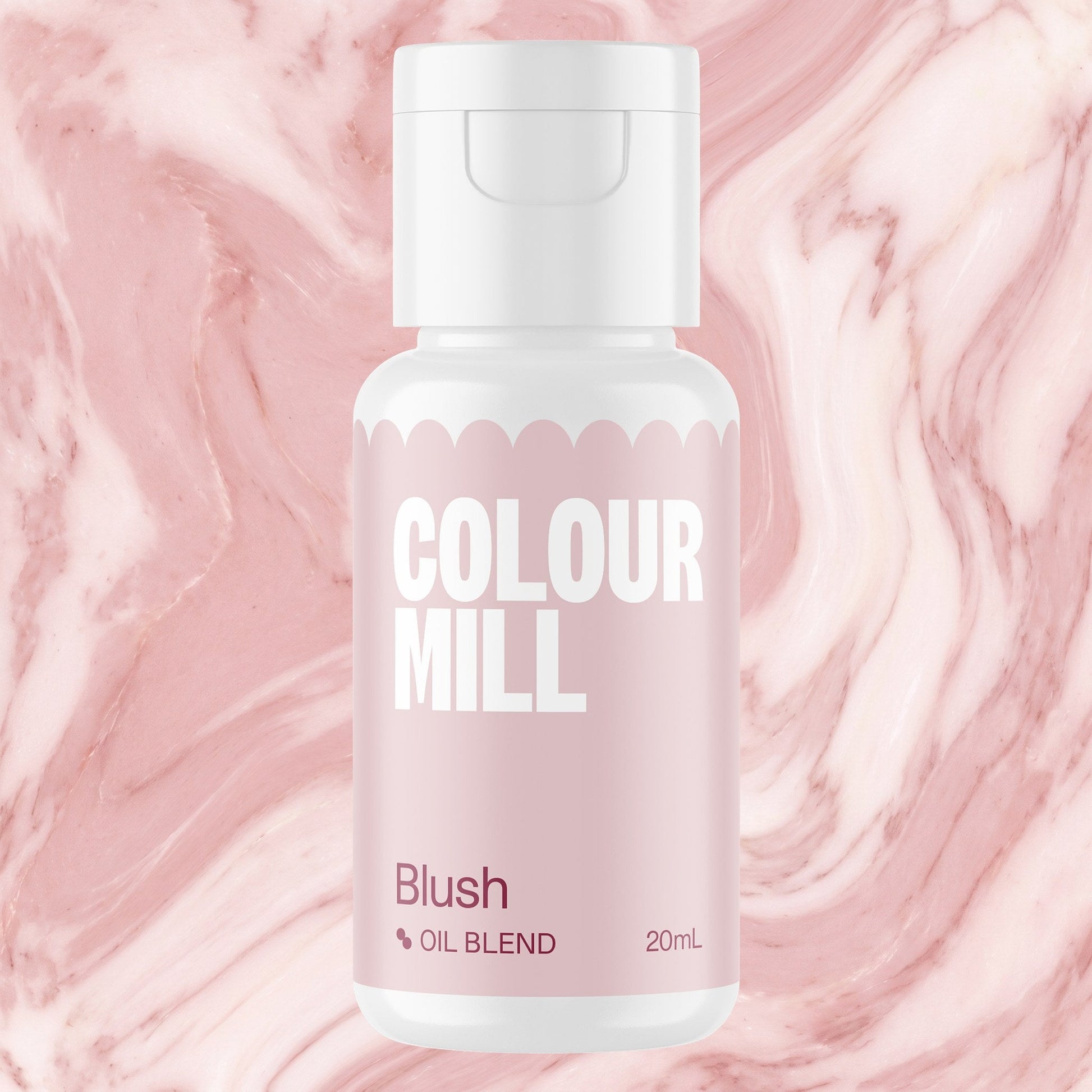 Colour Mill Blush 20ml oil based food coloring bottle on a marbled background
