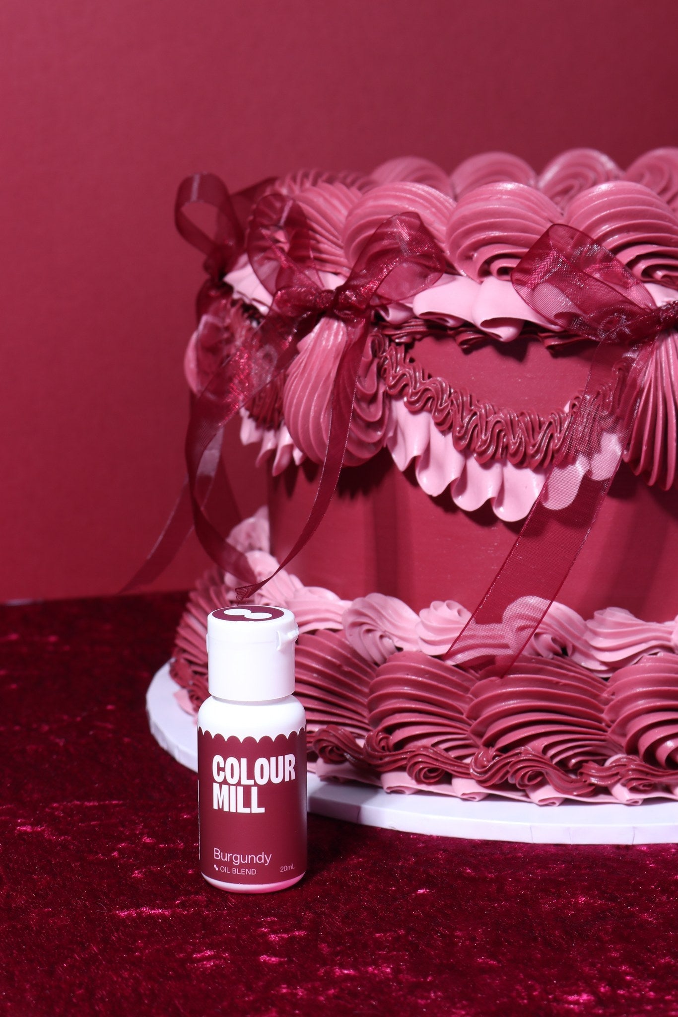 Cake decorated with buttercream colored using Colour Mill Burgundy oil based food coloring