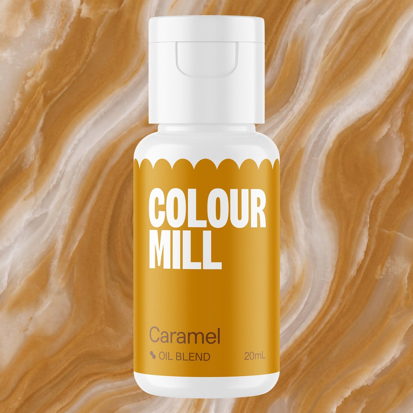 Colour Mill Caramel 20ml oil based food coloring bottle on a marbled background