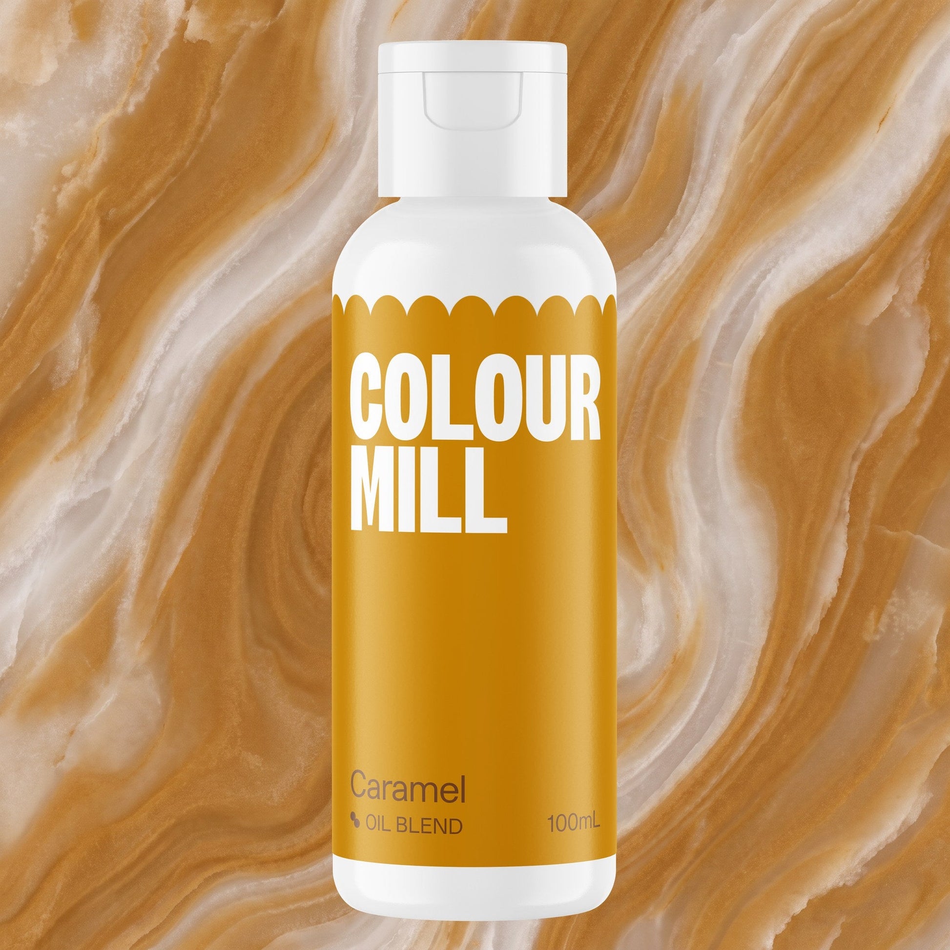 Colour Mill Caramel 100ml oil based food coloring bottle on a marbled background