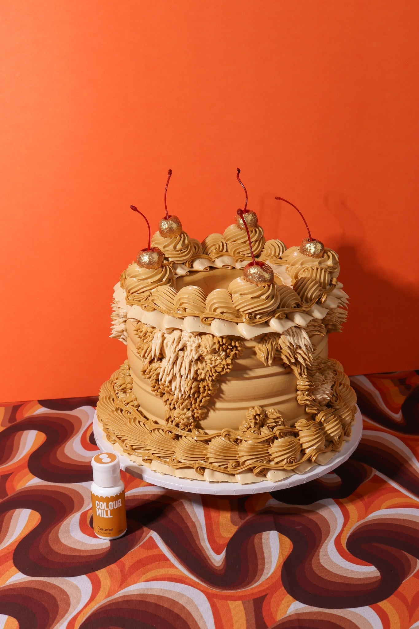 Cake decorated with buttercream colored using Colour Mill Caramel oil based food coloring
