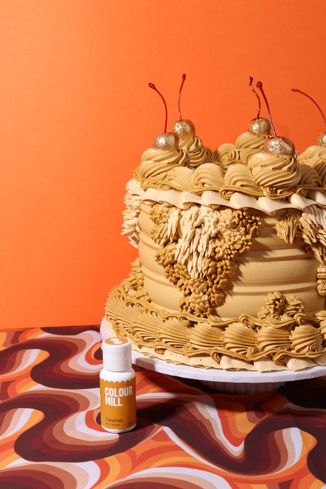 Cake decorated with buttercream colored using Colour Mill Caramel oil based food coloring