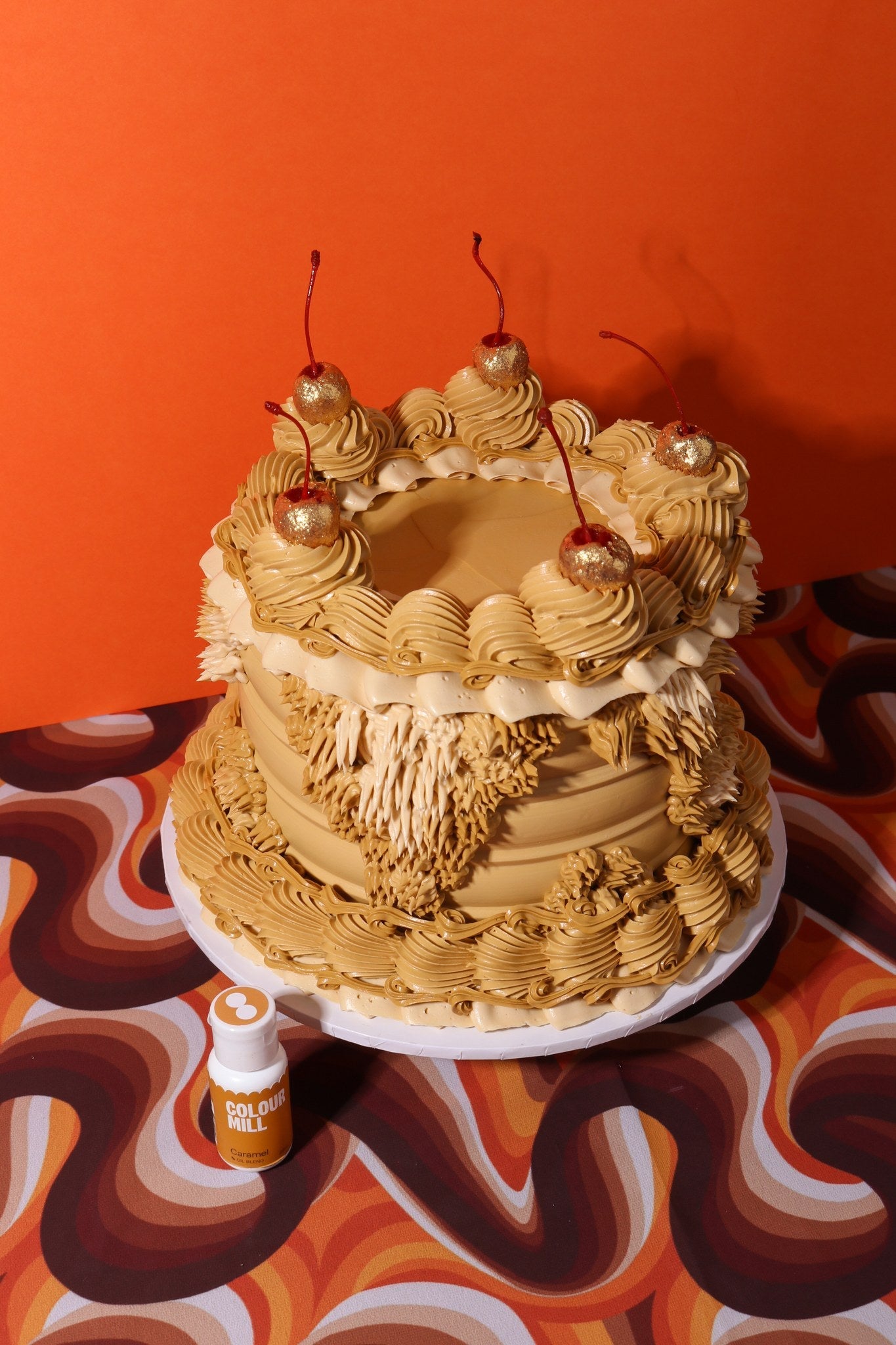 Cake decorated with buttercream colored using Colour Mill Caramel oil based food coloring