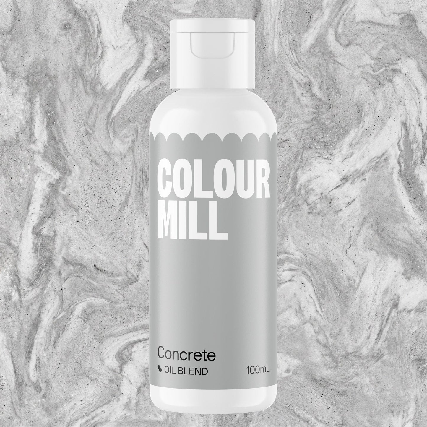 Colour Mill Concrete 100ml oil based food coloring bottle on a marbled background