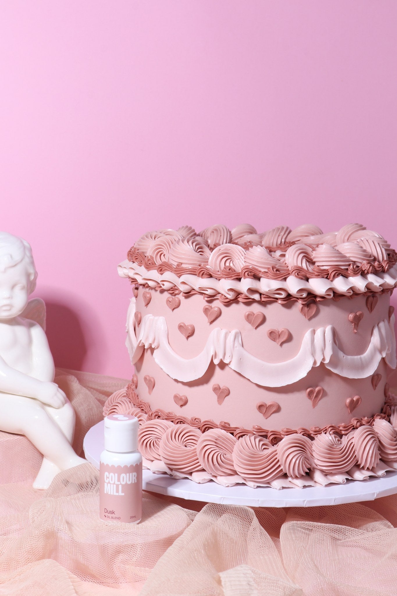 Cake decorated with buttercream colored using Colour Mill Dusk oil based food coloring
