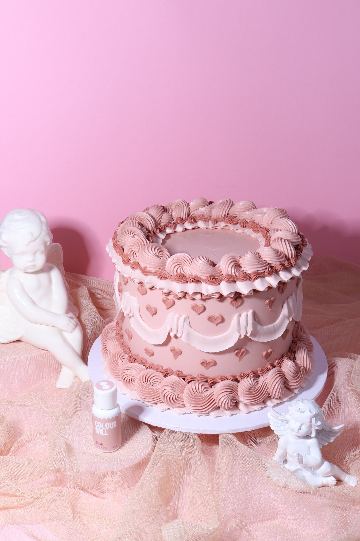 Cake decorated with buttercream colored using Colour Mill Dusk oil based food coloring