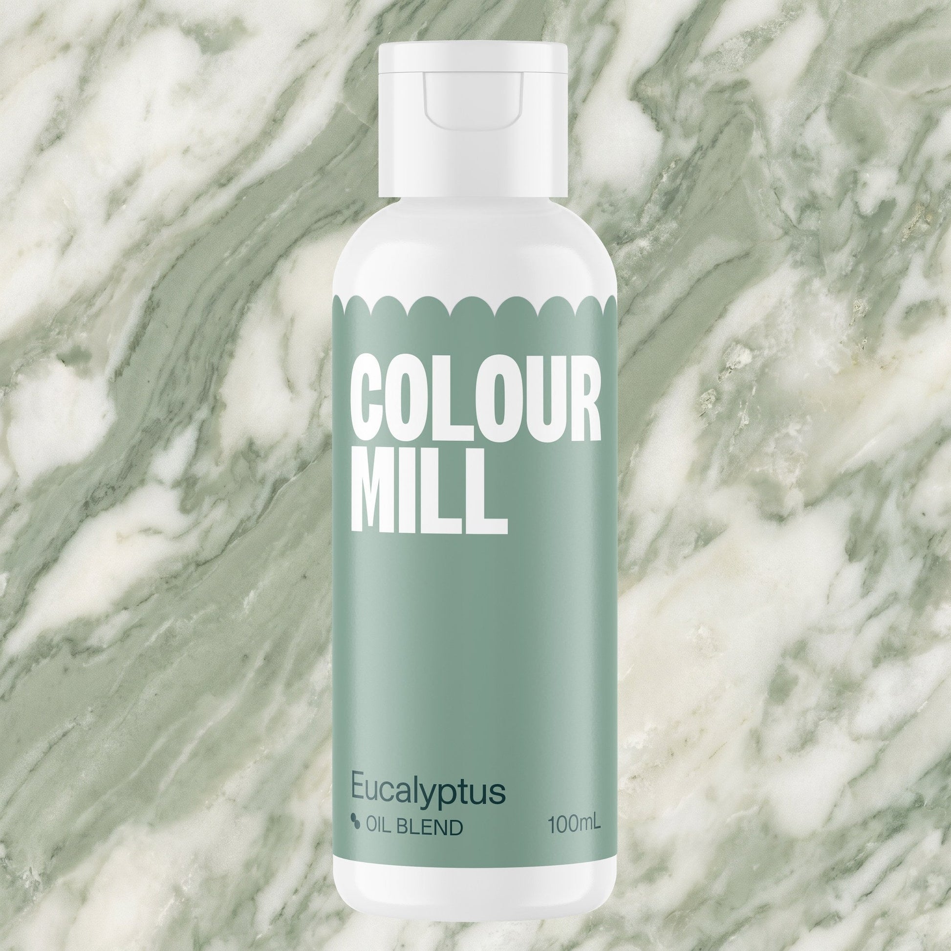 Colour Mill Eucalyptus 100ml oil based food coloring bottle on a marbled background
