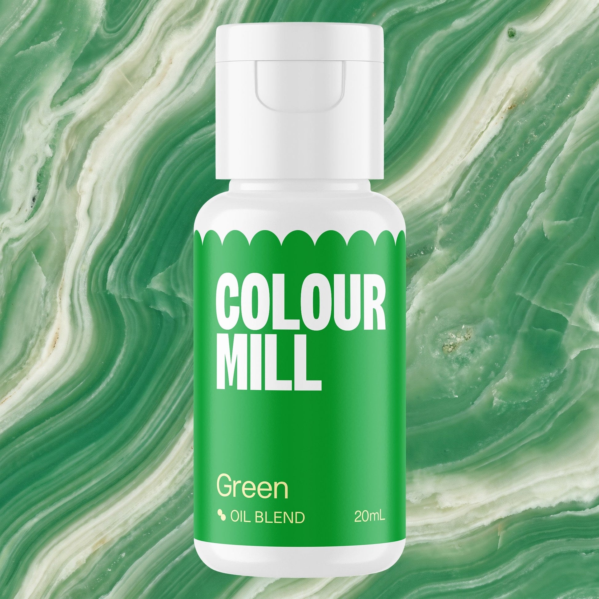 Colour Mill Green 20ml oil based food coloring bottle on a marbled background