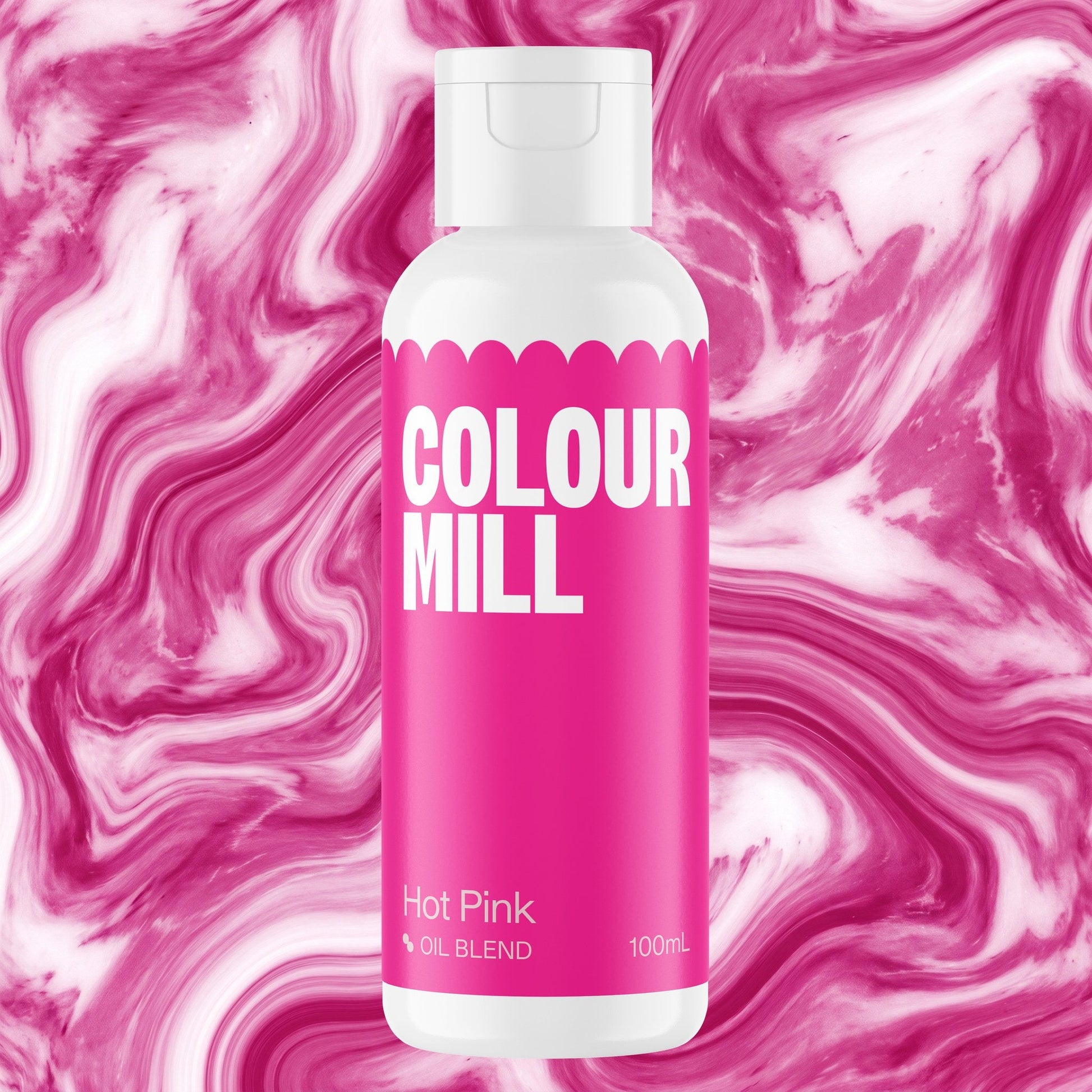 Colour Mill Hot Pink 100ml oil based food coloring bottle on a marbled background