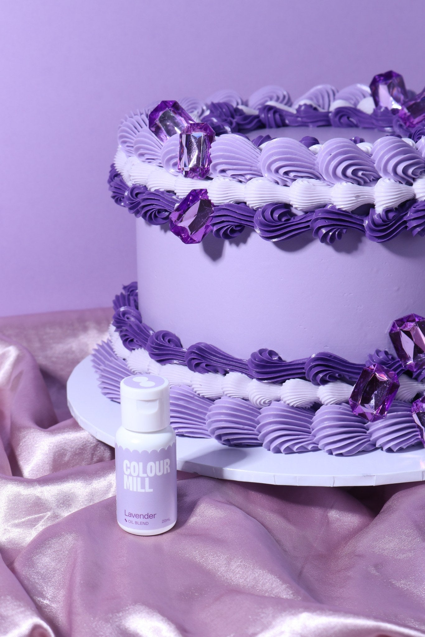 Cake decorated with buttercream colored using Colour Mill Lavender oil based food coloring