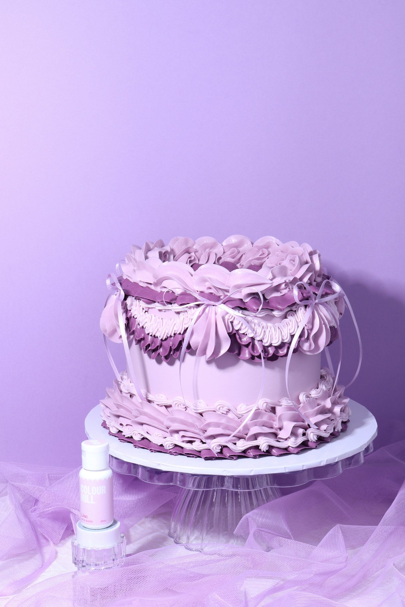Cake decorated with buttercream colored using Colour Mill Lilac oil based food coloring