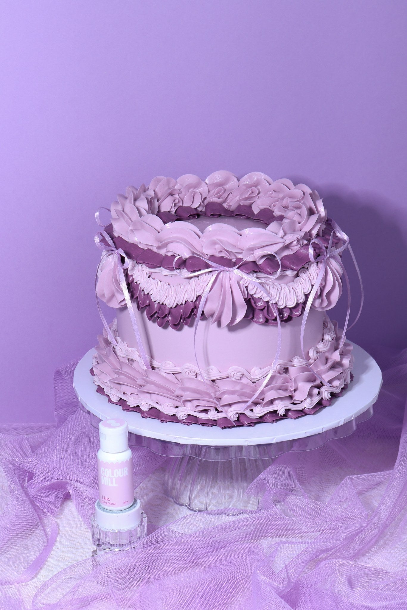 Cake decorated with buttercream colored using Colour Mill Lilac oil based food coloring