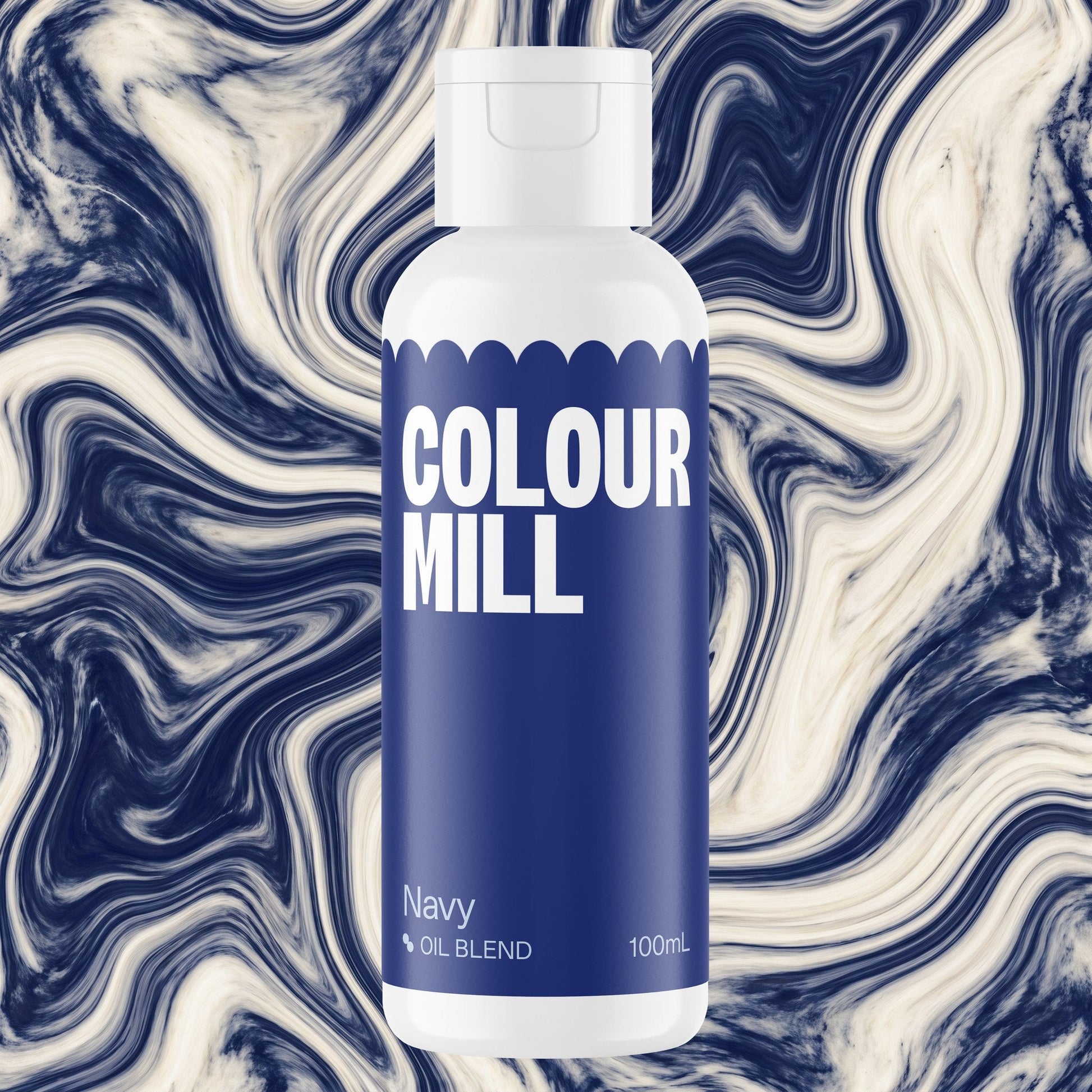 Colour Mill Navy 100ml oil based food coloring bottle on a marbled background