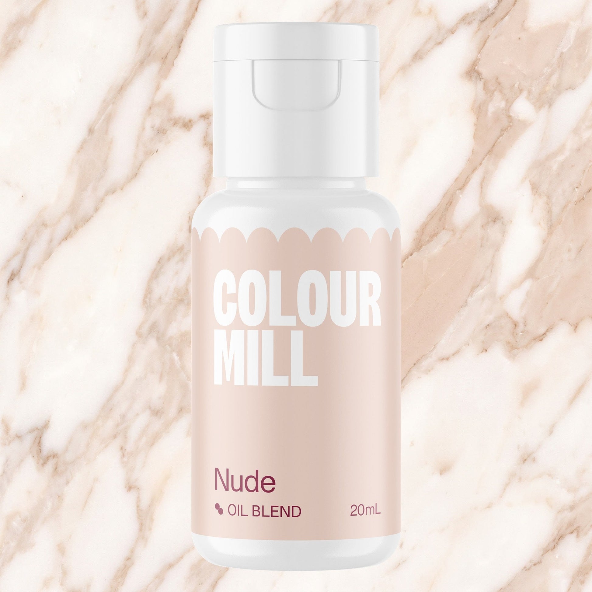Colour Mill Nude 20ml oil based food coloring bottle on a marbled background