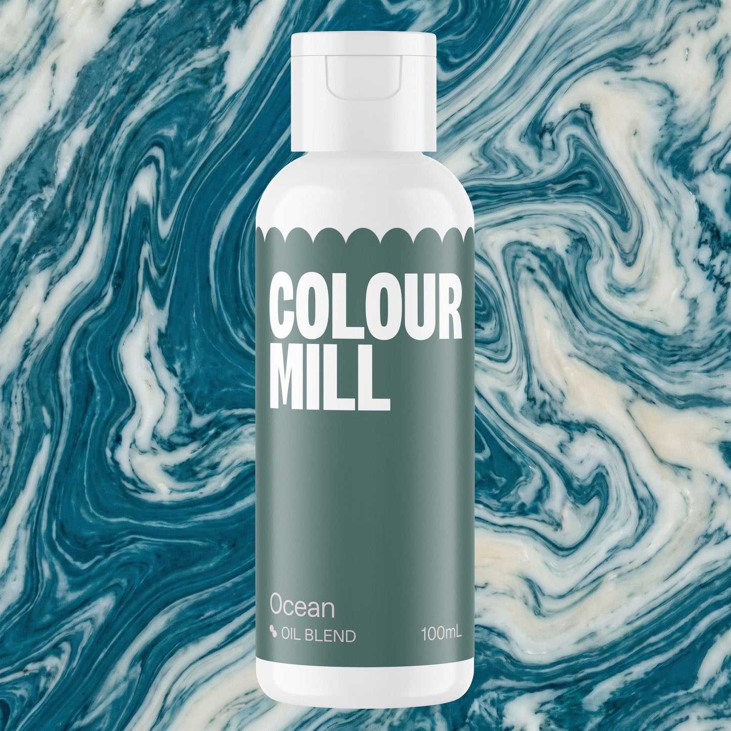 Colour Mill Ocean 100ml oil based food coloring bottle on a marbled background