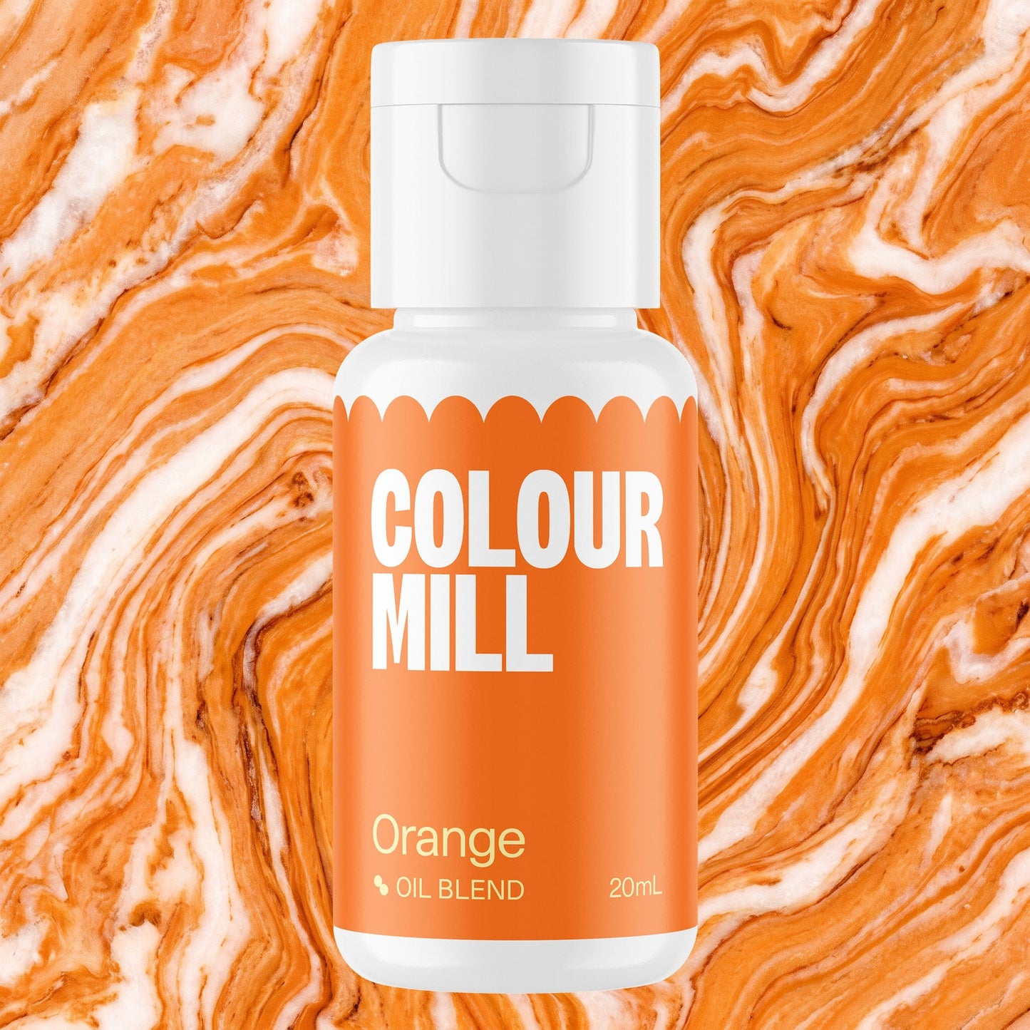 Colour Mill Orange 20ml oil based food coloring bottle on a marbled background