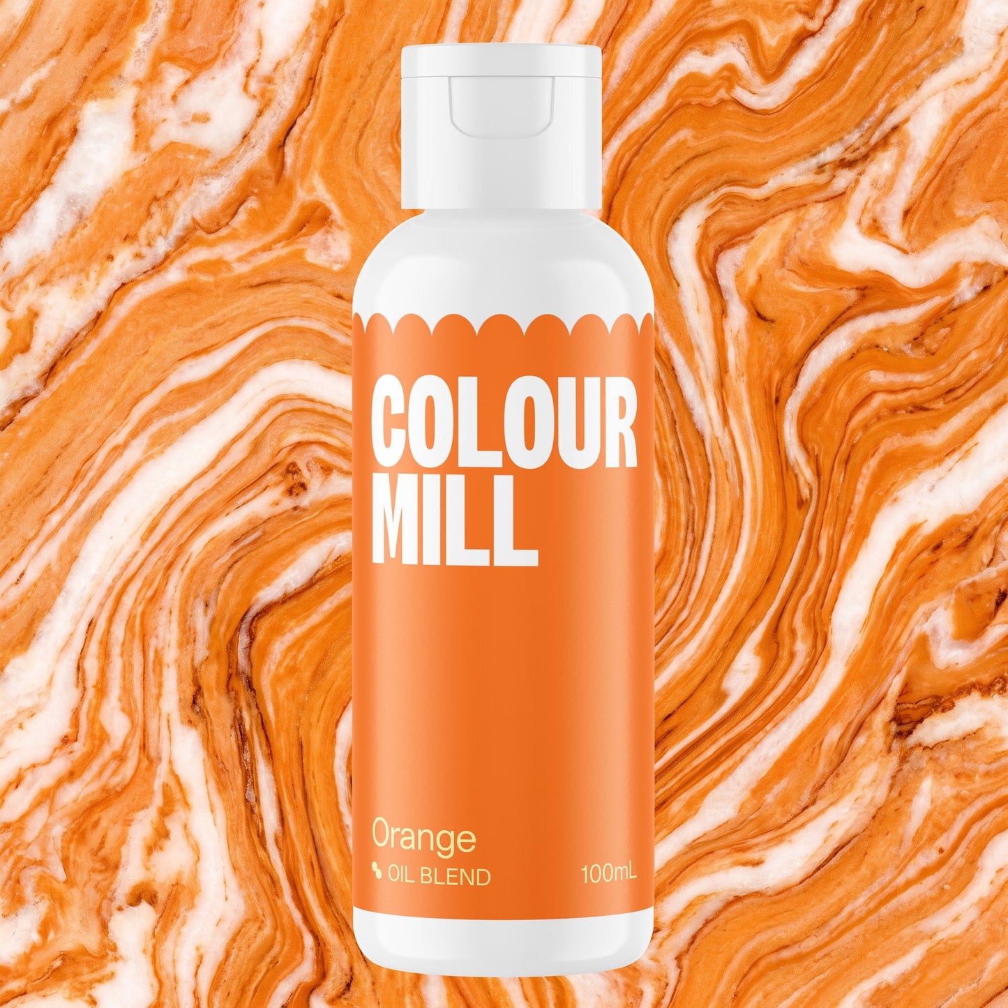 Colour Mill Orange 100ml oil based food coloring bottle on a marbled background