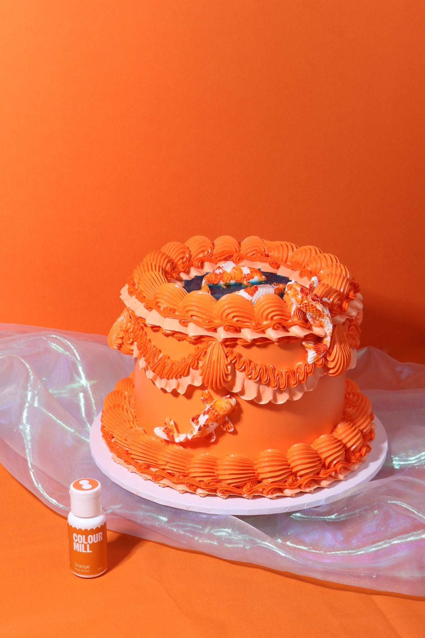 Cake decorated with buttercream colored using Colour Mill Orange oil based food coloring