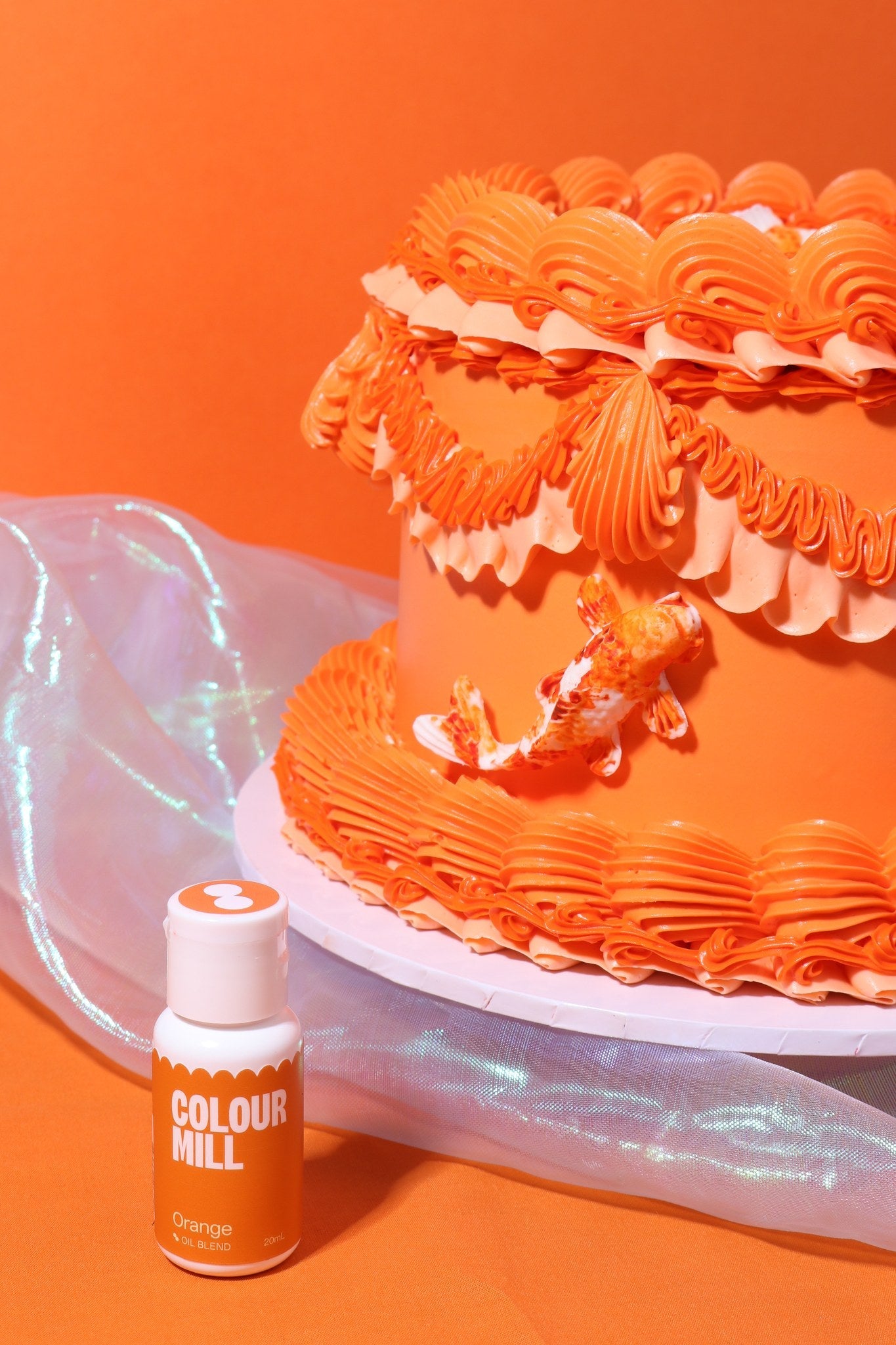 Cake decorated with buttercream colored using Colour Mill Orange oil based food coloring