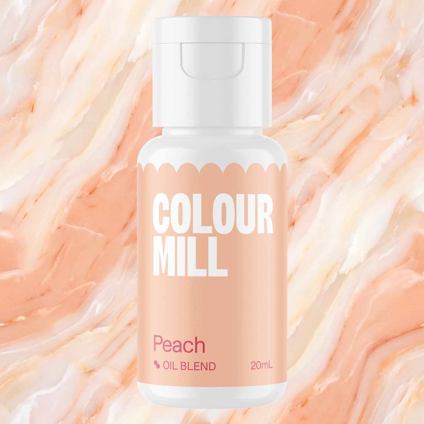 Colour Mill Peach 20ml oil based food coloring bottle on a marbled background