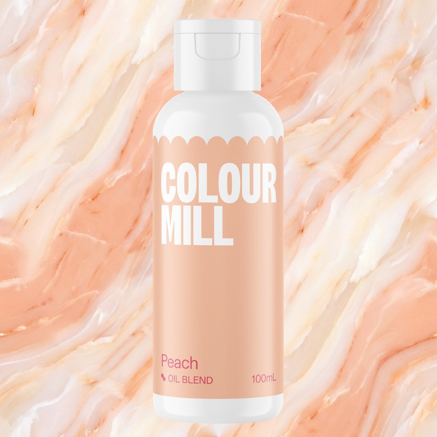 Colour Mill Peach 100ml oil based food coloring bottle on a marbled background