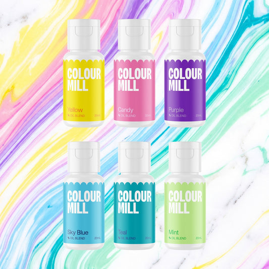 Colour Mill Pool Party Pack of 6 20ml oil based food coloring bottles on a soft pool party watercolour marble background