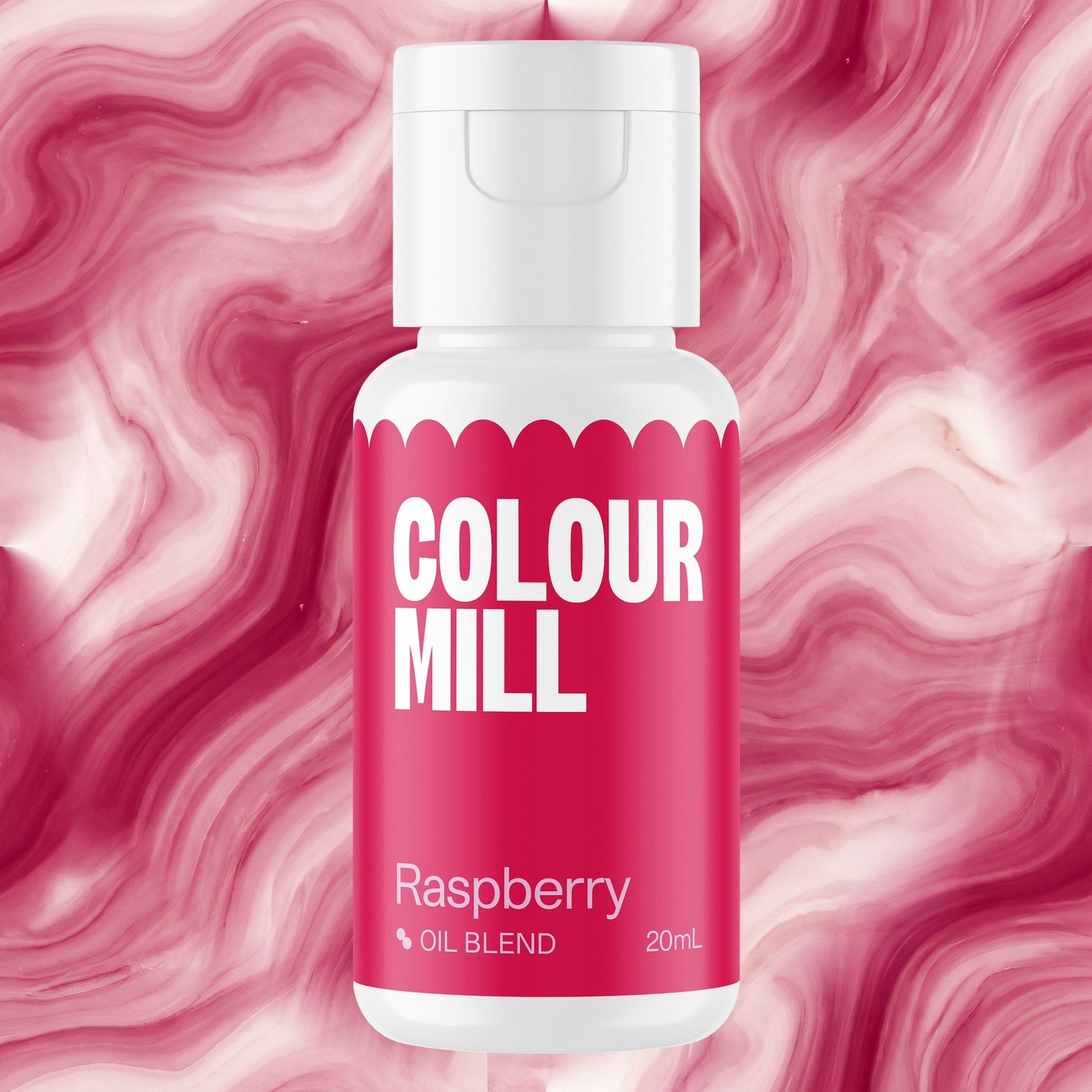 Colour Mill Raspberry 20ml oil based food coloring bottle on a marbled background