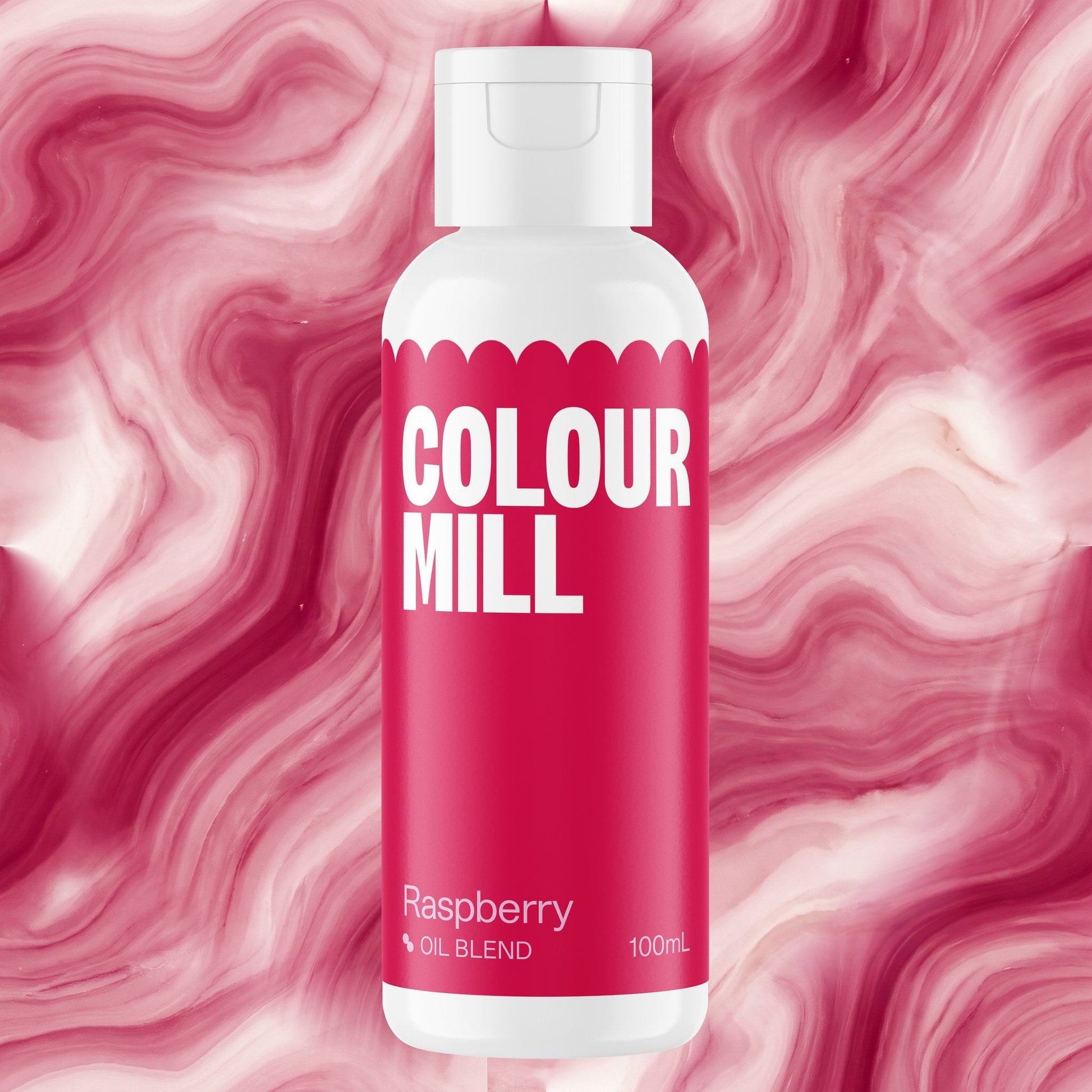 Colour Mill Raspberry 100ml oil based food coloring bottle on a marbled background