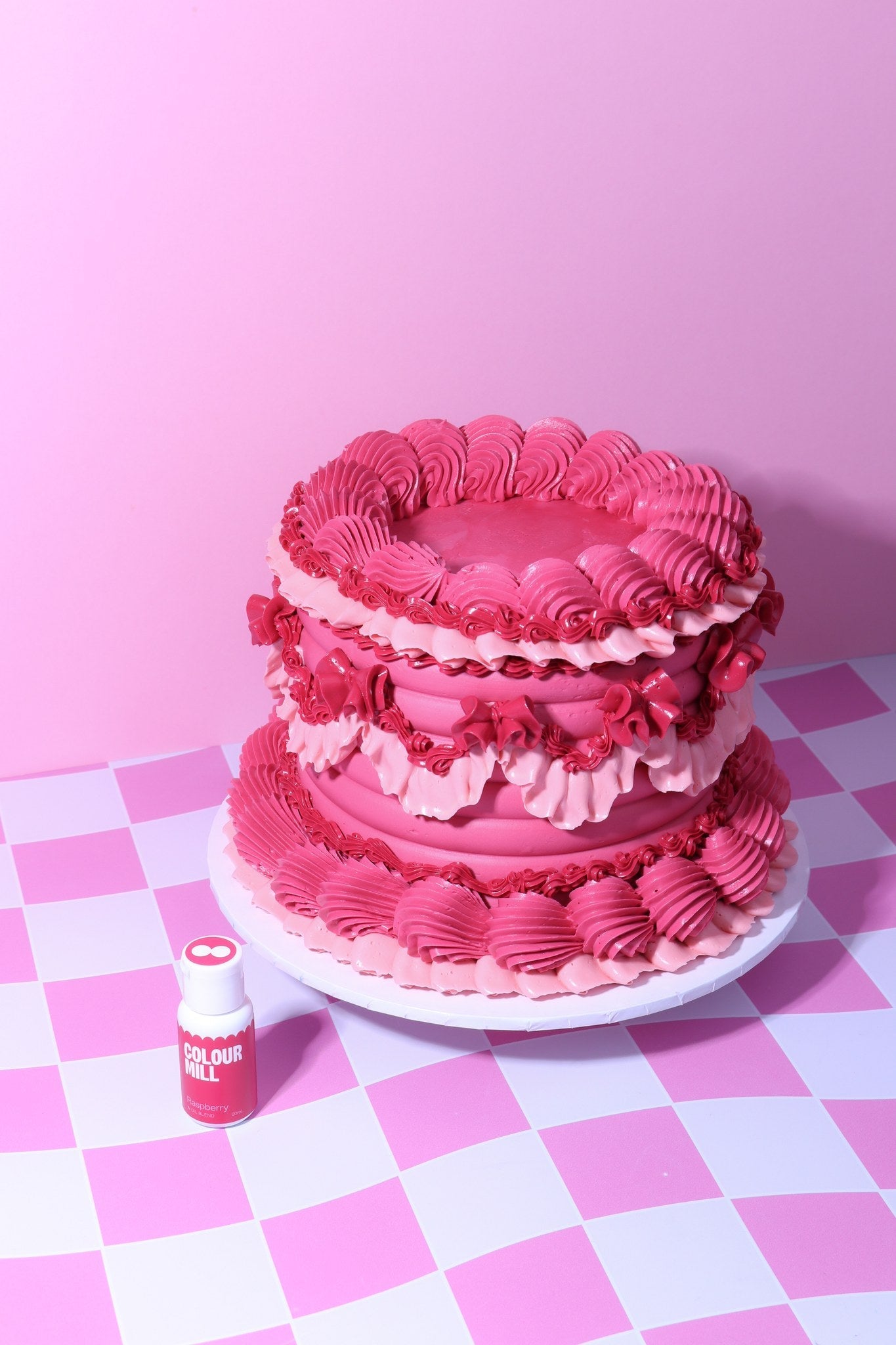 Cake decorated with buttercream colored using Colour Mill Raspberry oil based food coloring