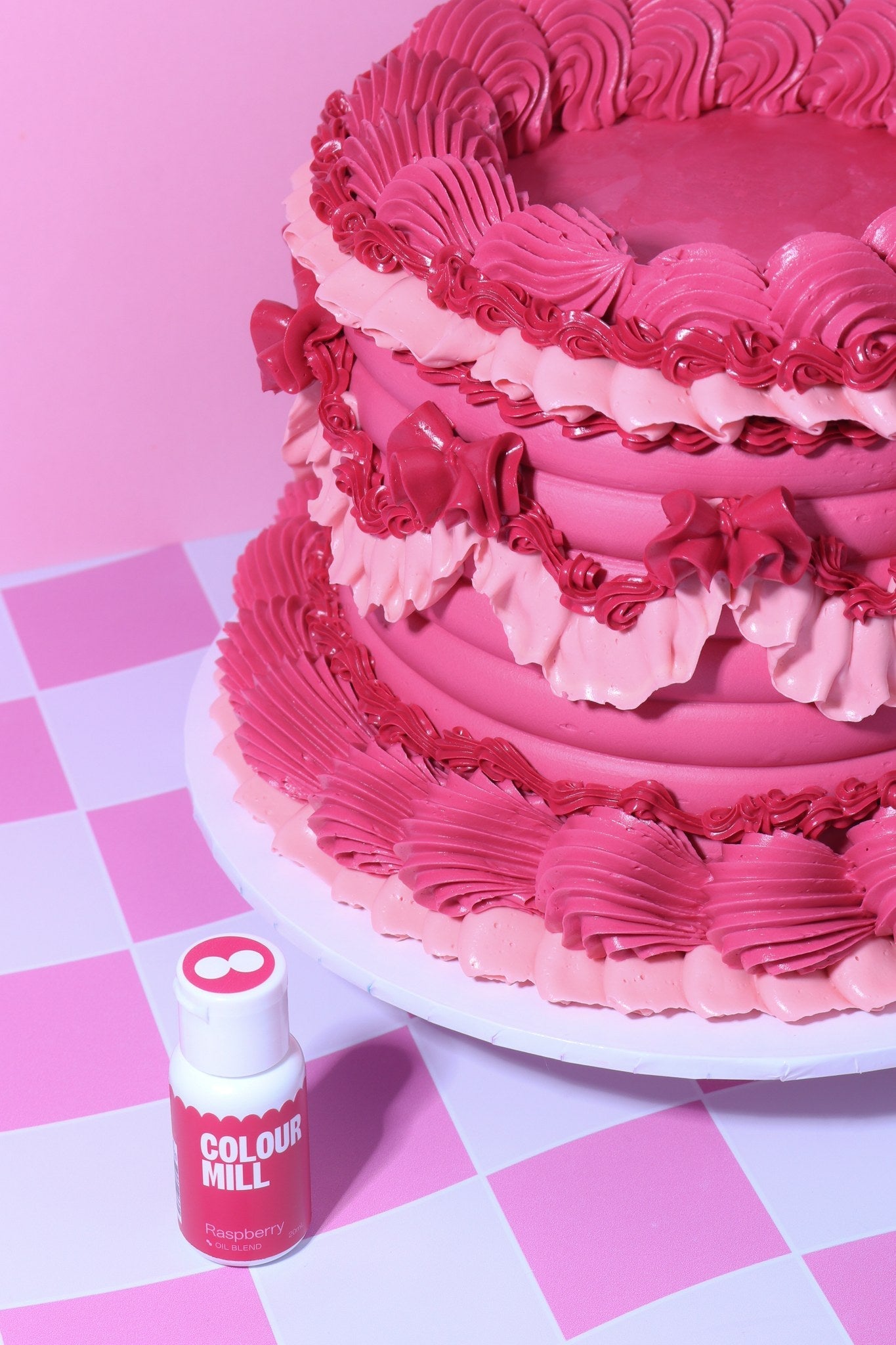 Cake decorated with buttercream colored using Colour Mill Raspberry oil based food coloring