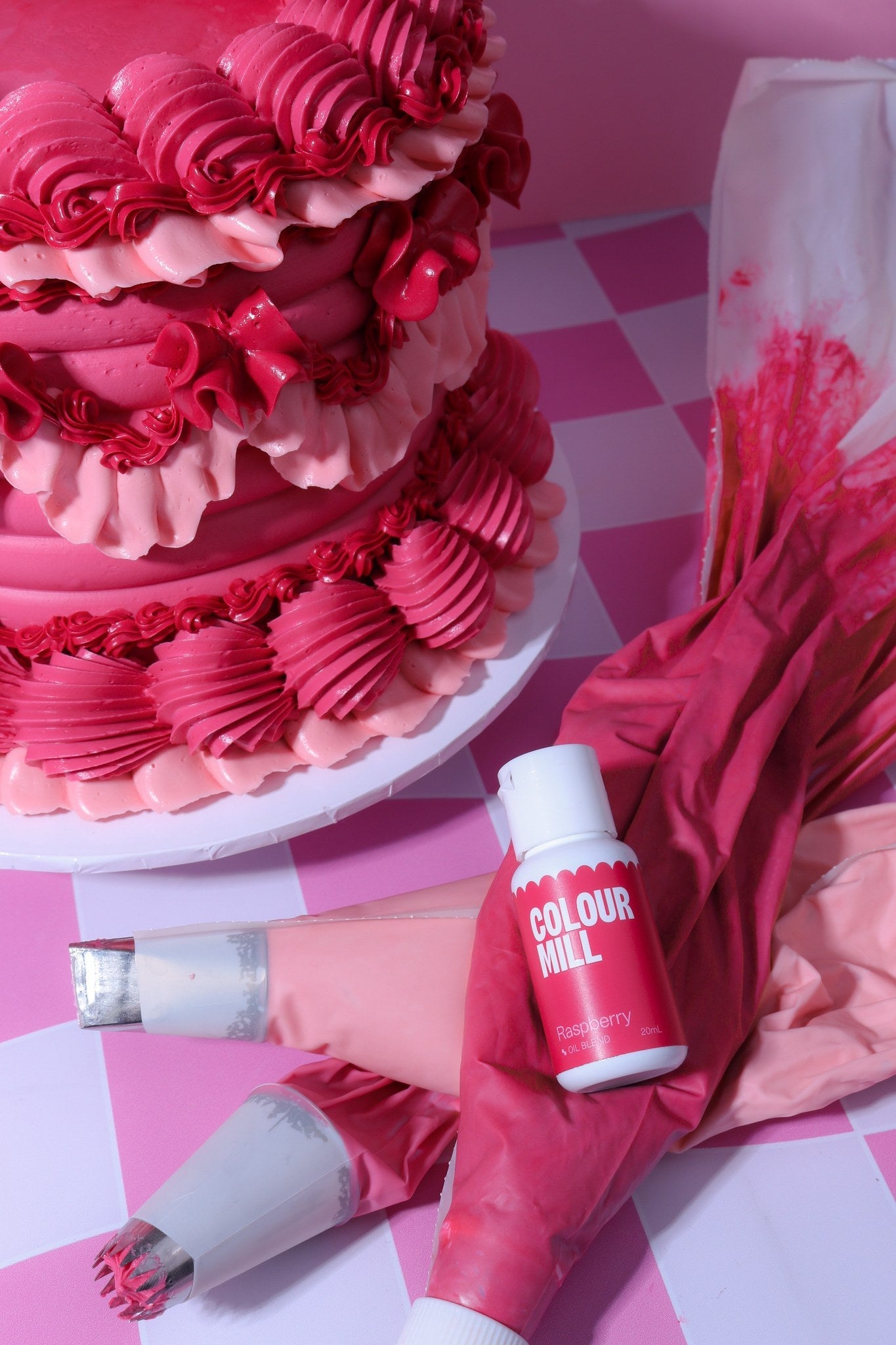 Cake decorated with buttercream colored using Colour Mill Raspberry oil based food coloring