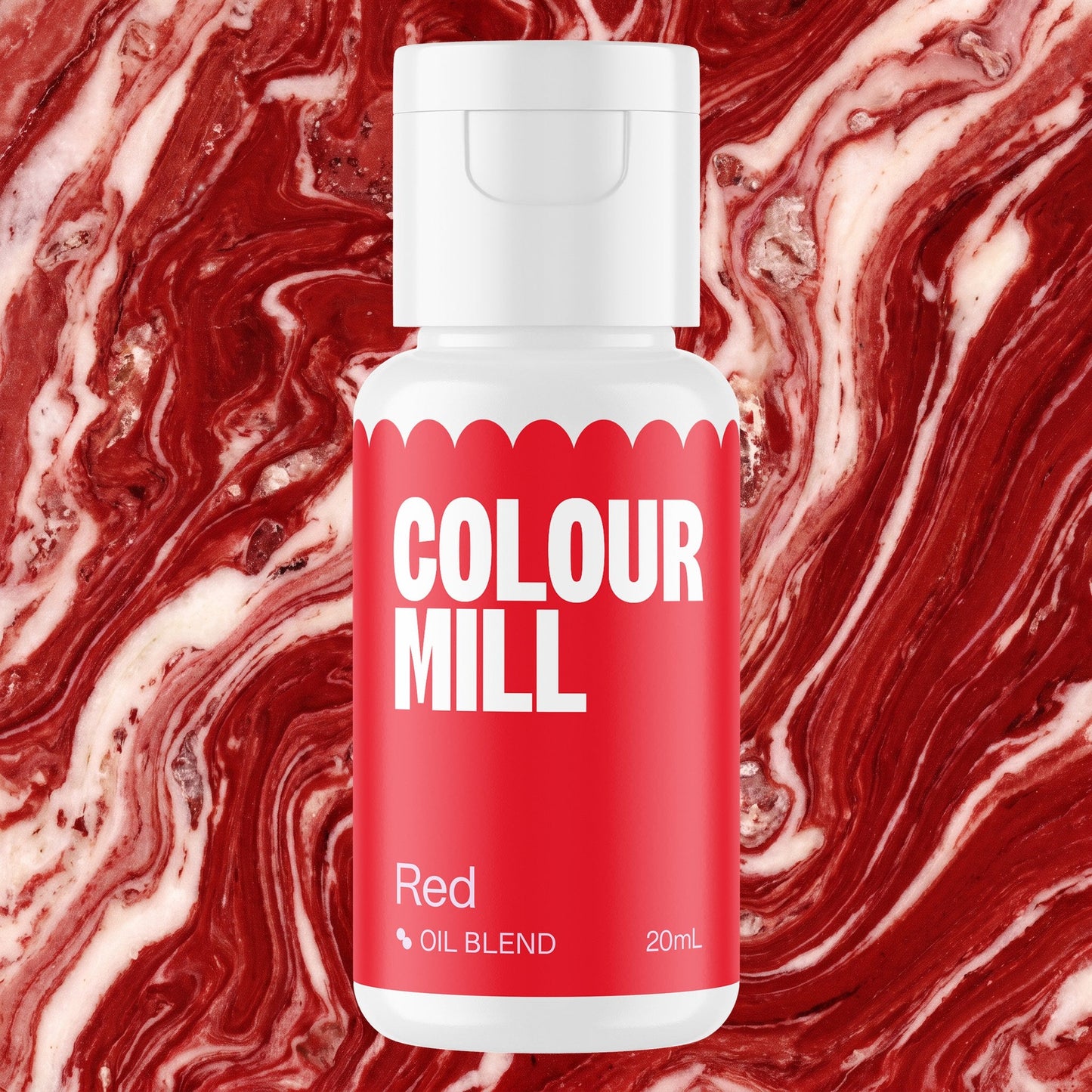 Colour Mill Red 20ml oil based food coloring bottle on a marbled background