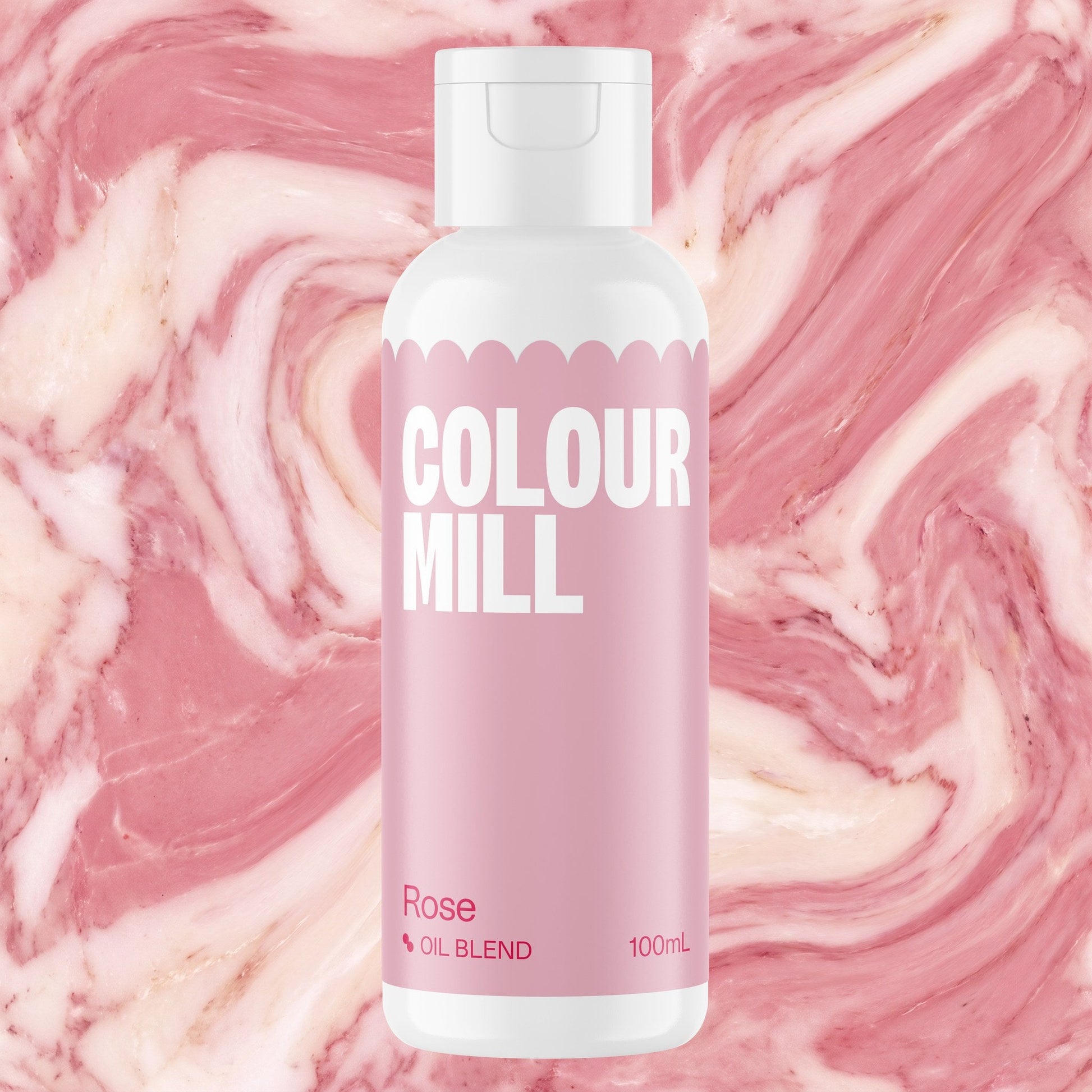 Colour Mill Rose 100ml oil based food coloring bottle on a marbled background