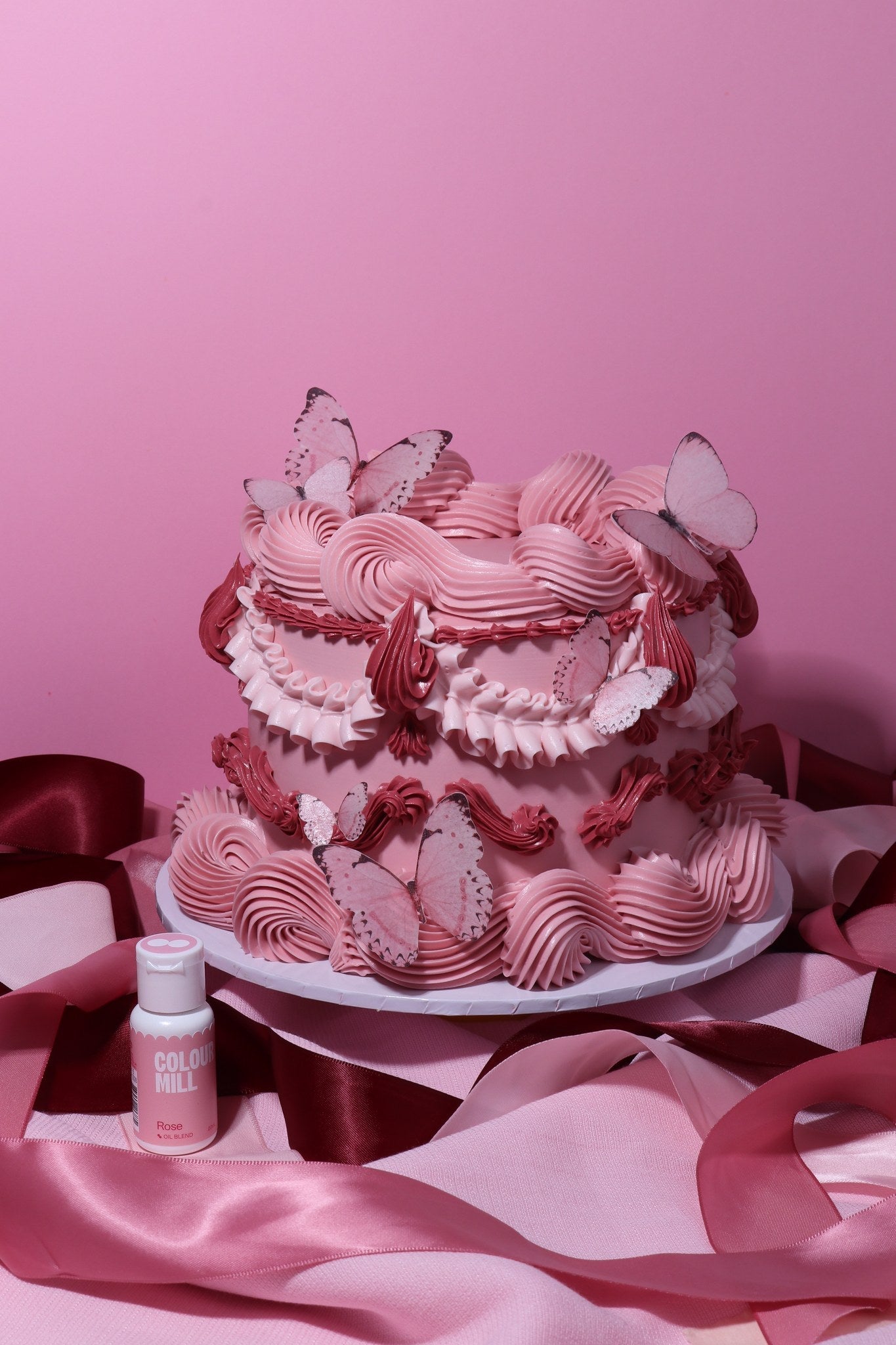 Cake decorated with buttercream colored using Colour Mill Rose oil based food coloring