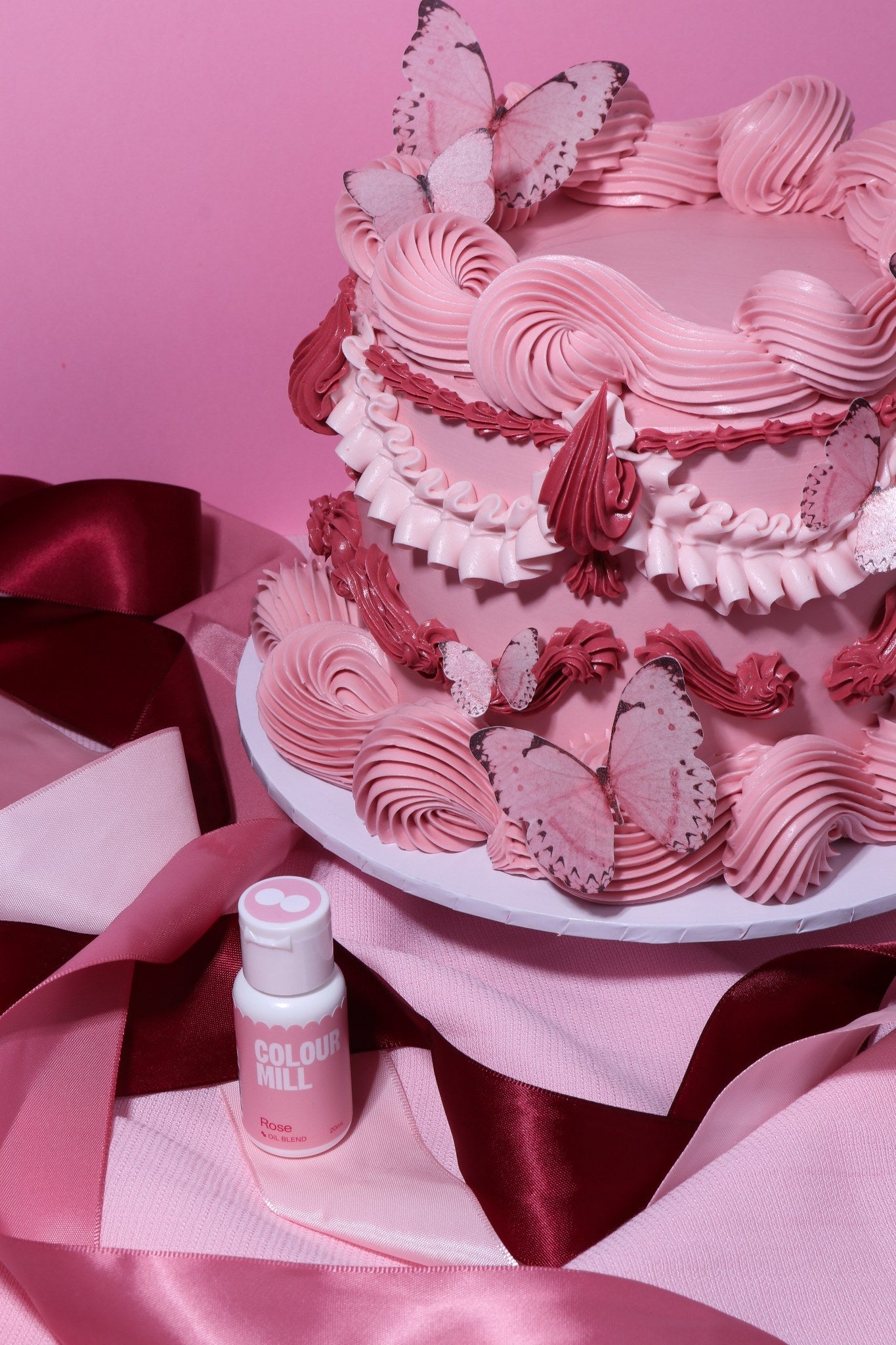 Cake decorated with buttercream colored using Colour Mill Rose oil based food coloring
