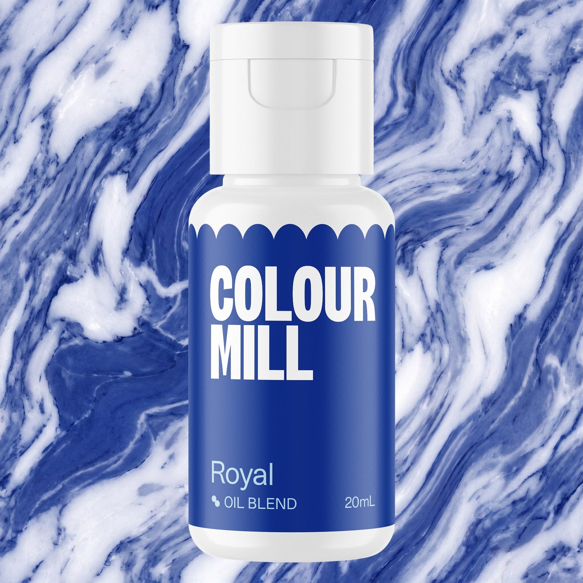 Colour Mill Royal Blue 20ml oil based food coloring bottle on a marbled background