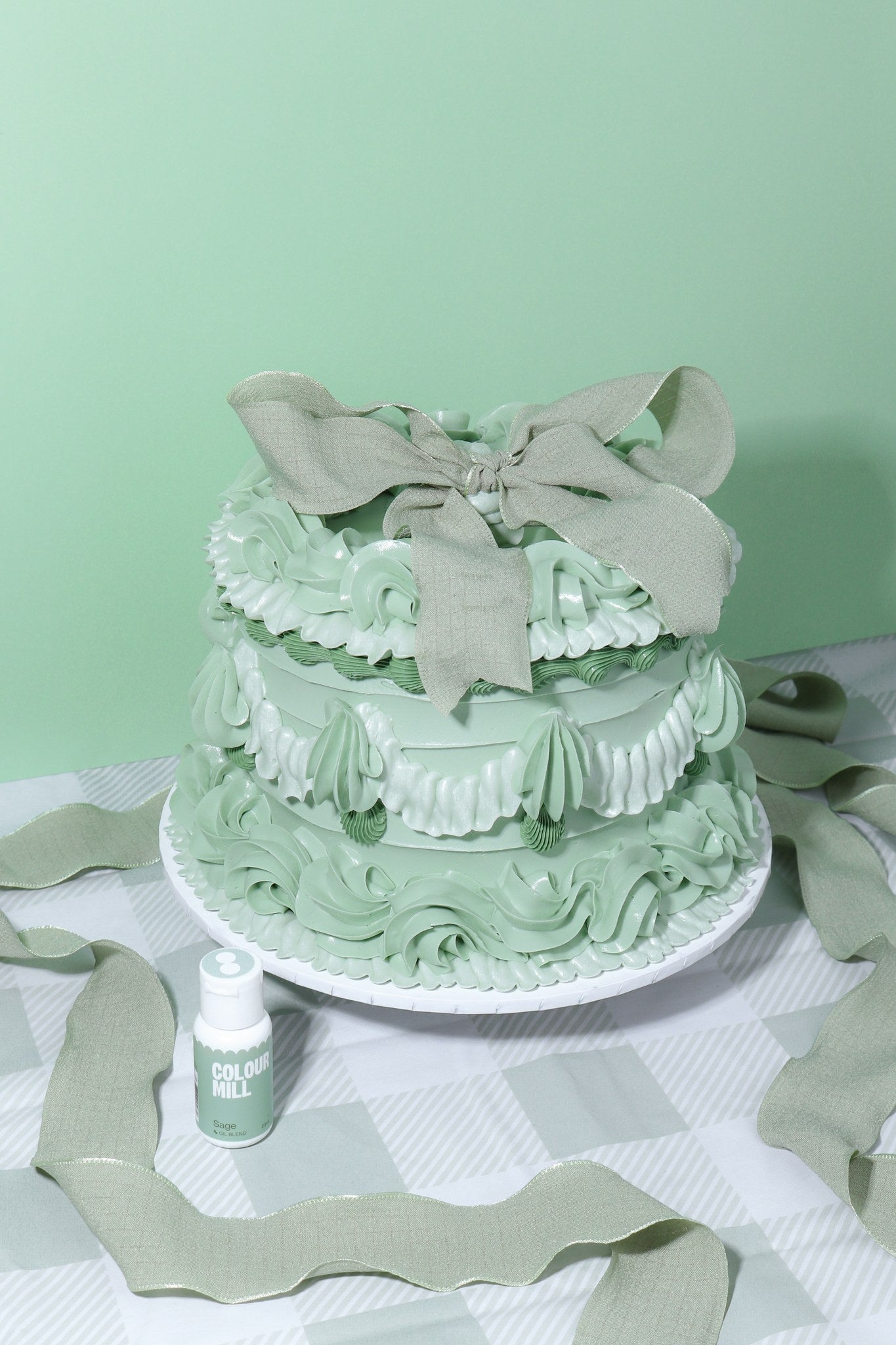Cake decorated with buttercream colored using Colour Mill Sage oil based food coloring