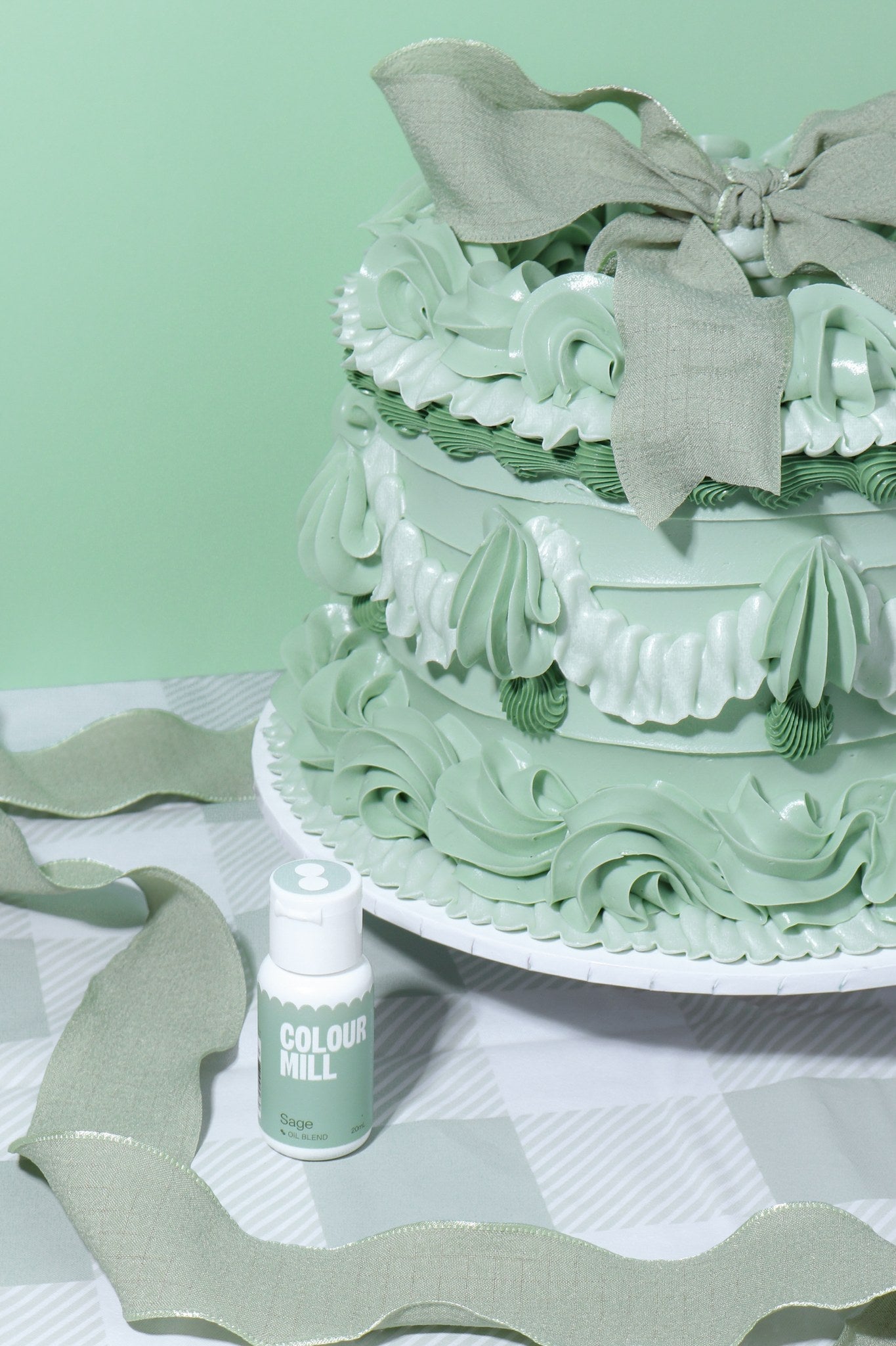 Cake decorated with buttercream colored using Colour Mill Sage oil based food coloring