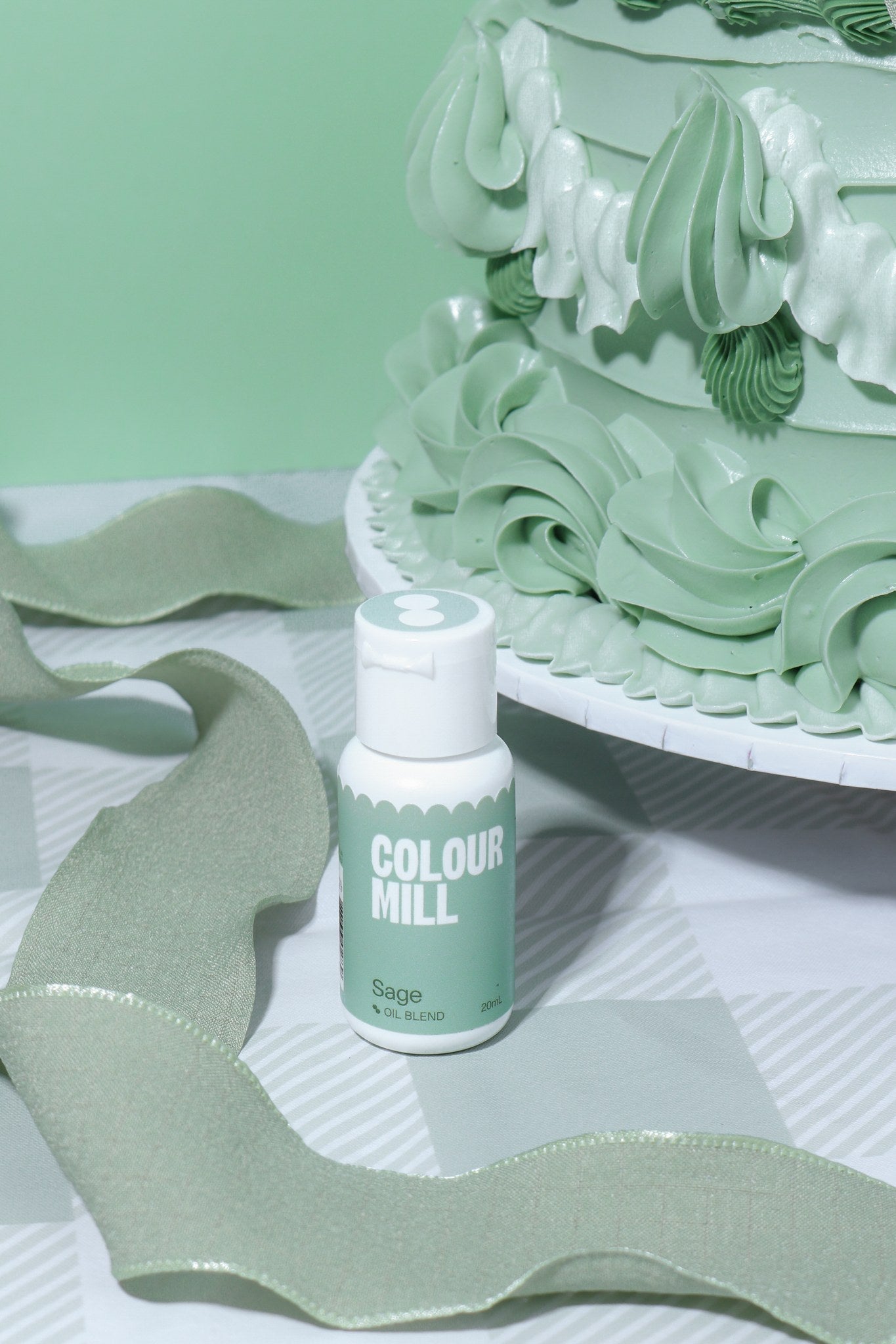Cake decorated with buttercream colored using Colour Mill Sage oil based food coloring