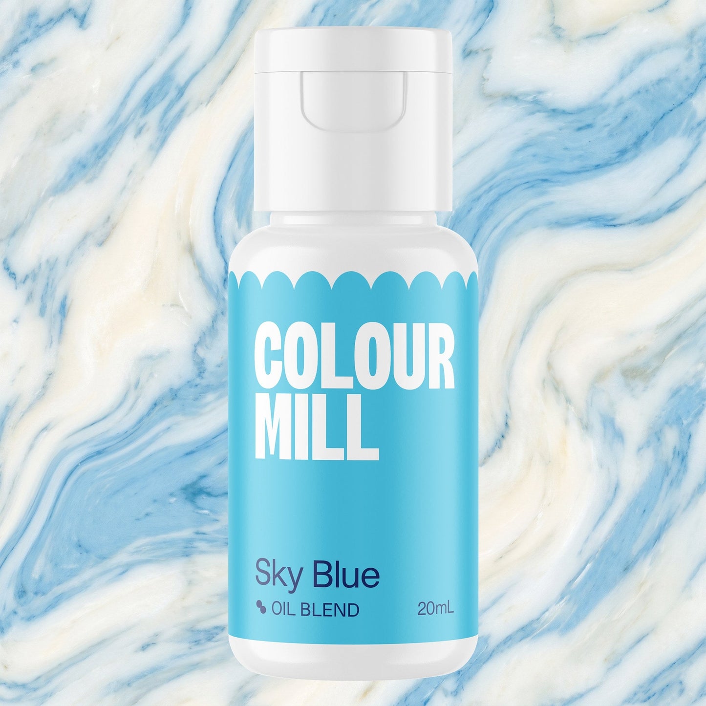 Colour Mill Sky Blue 20ml oil based food coloring bottle on a marbled background