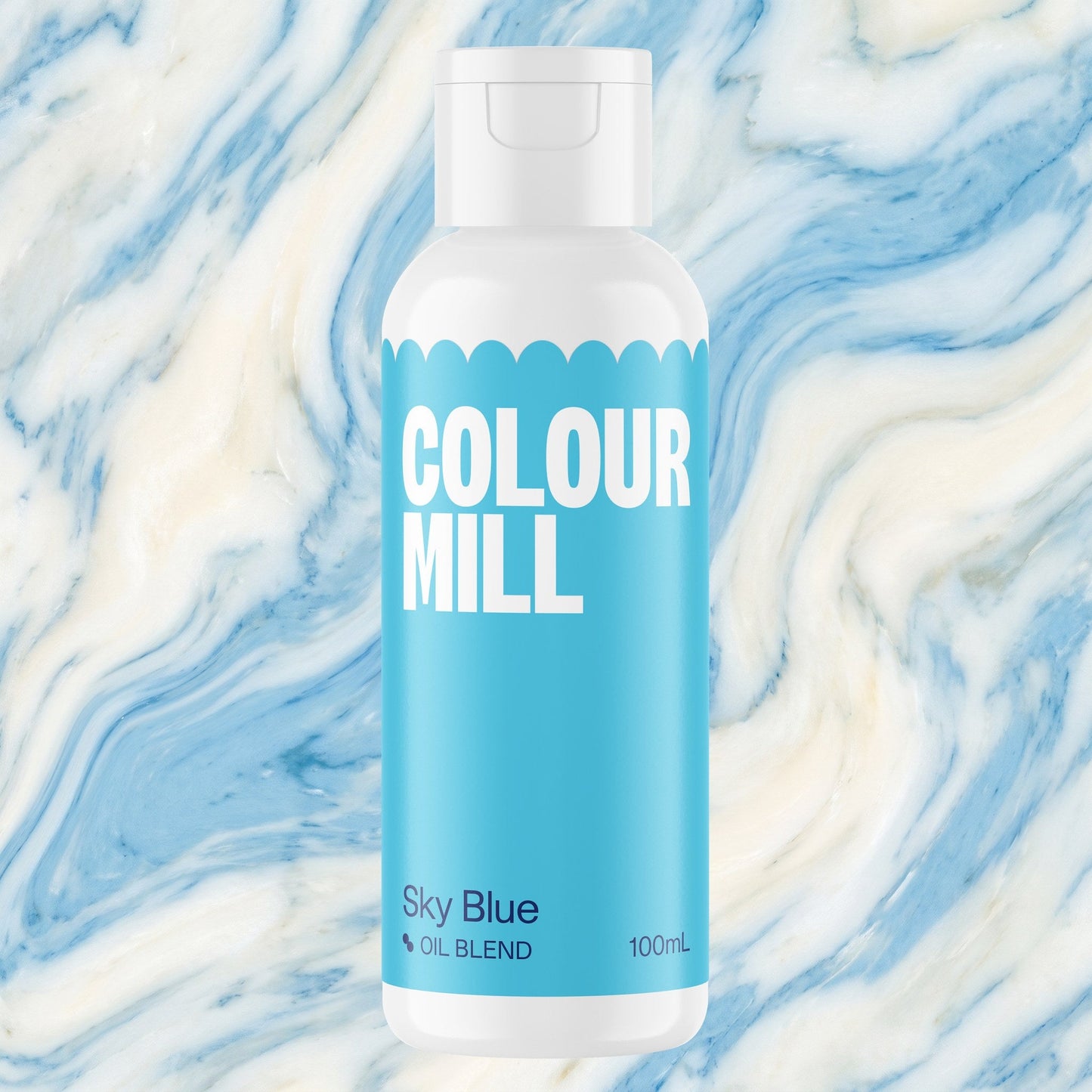 Colour Mill Sky Blue 100ml oil based food coloring bottle on a marbled background