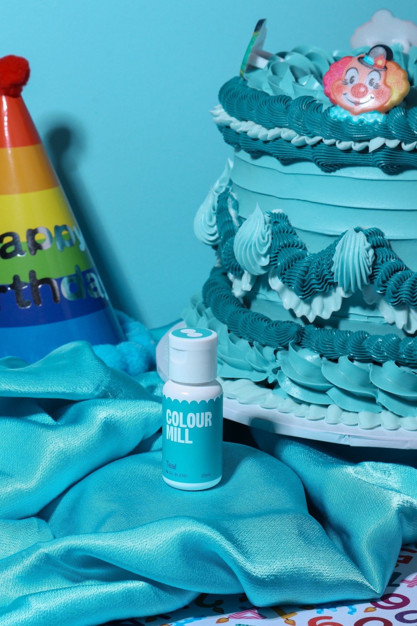 Cake decorated with buttercream colored using Colour Mill Teal oil based food coloring